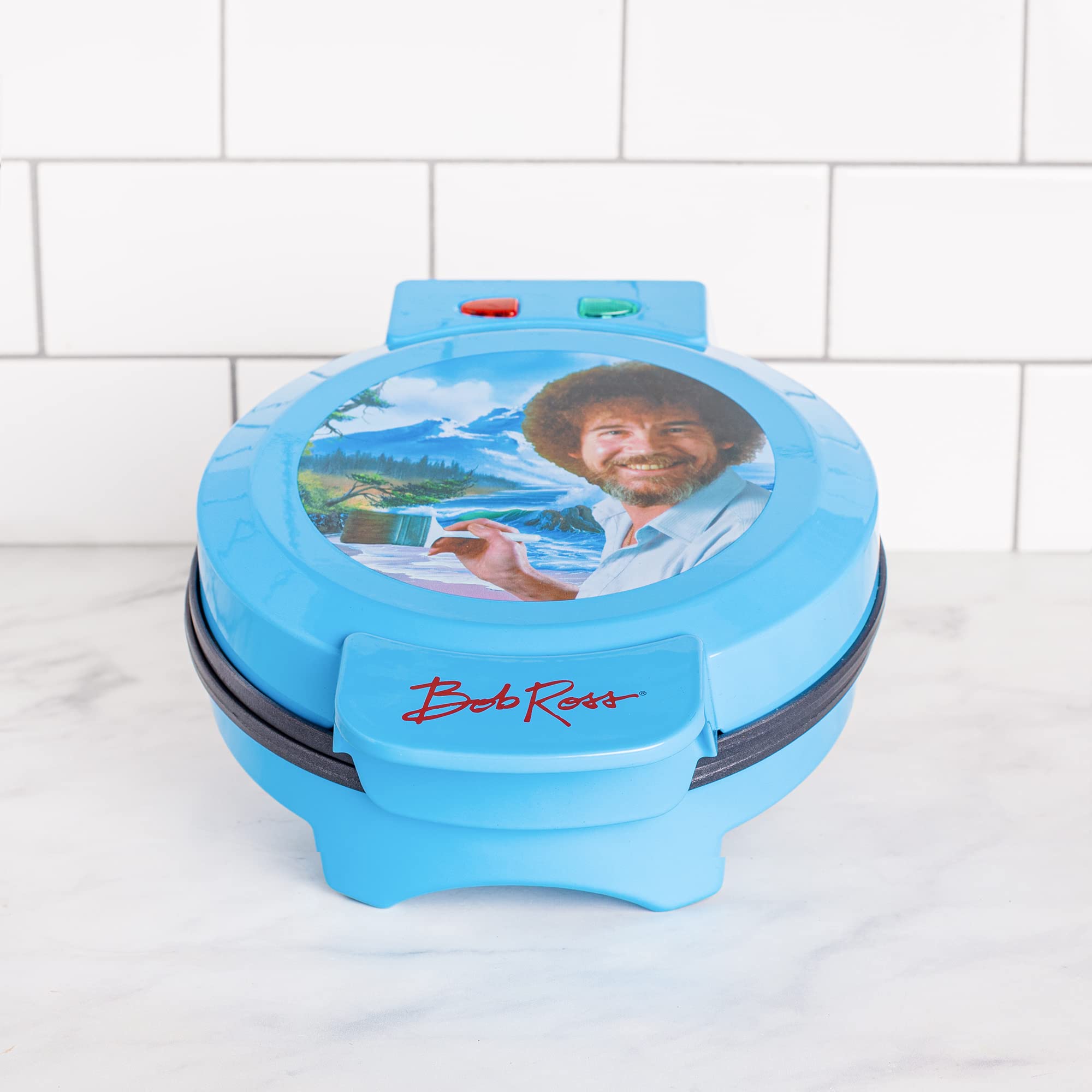 Uncanny Brands Bob Ross Waffle Maker - Create Waffles with Bob Ross Iconic Face - Non-Stick Waffle Iron for Breakfast, Party & Gift - Perfect for Home, Camping & Holiday Cooking