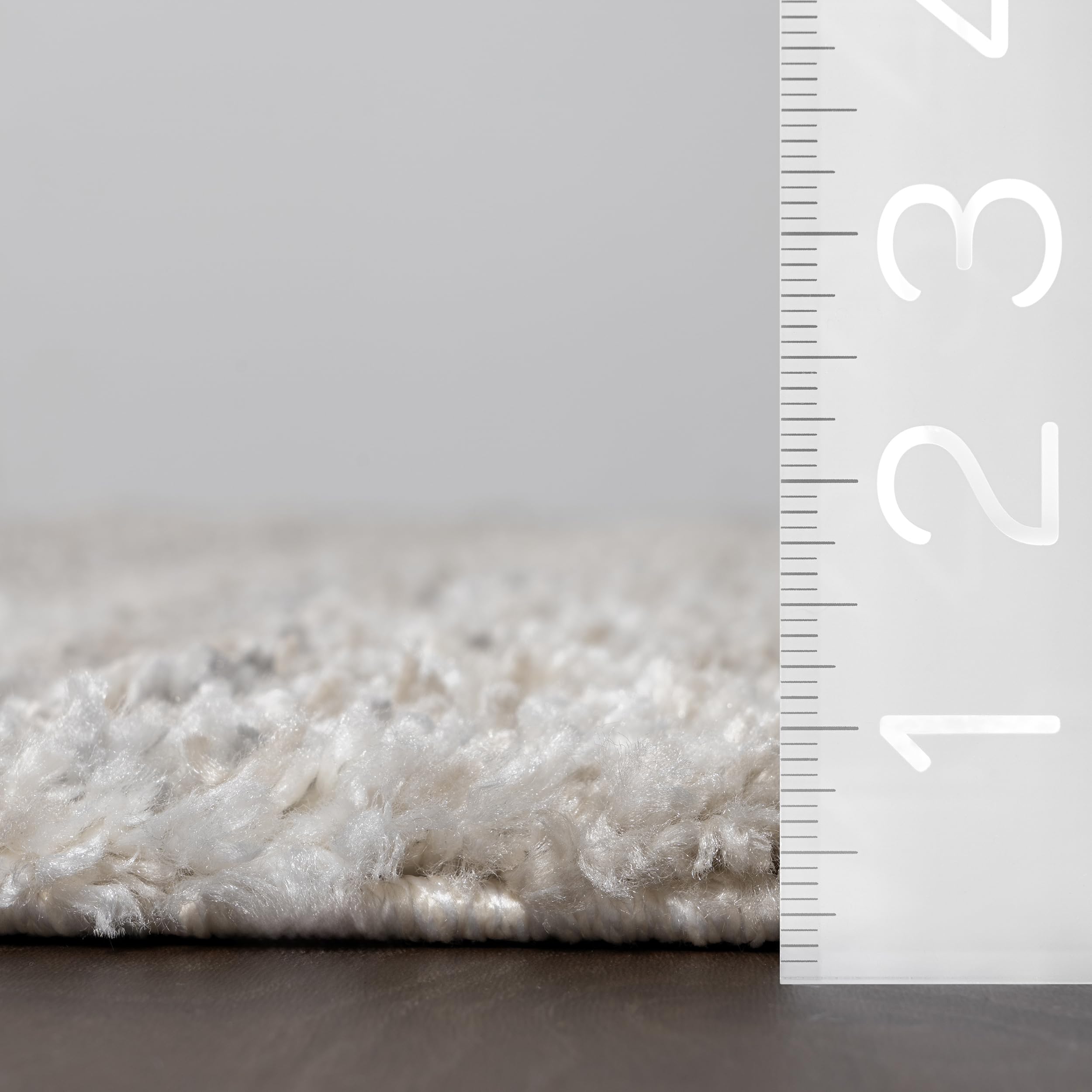 nuLOOM Brooke Shag Tasseled Area Rug - Soft Plush 7x9 Oval Ivory Rug for Living Room, Bedroom, Dining Room & Nursery | Cozy Home Decor, Perfect for Family Gatherings & Relaxation