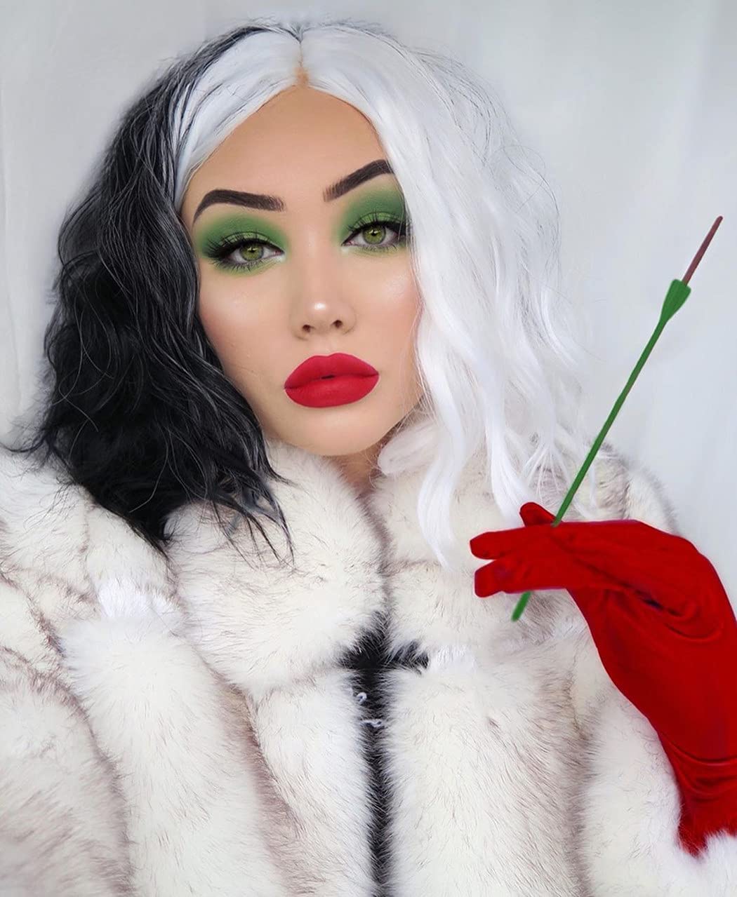 Stylish Black and White Cruella De Vil Wig for Women - Short Curly Wavy Costume Hairpiece | Soft & Comfortable for Halloween, Cosplay, Themed Parties & Dress-Up Events