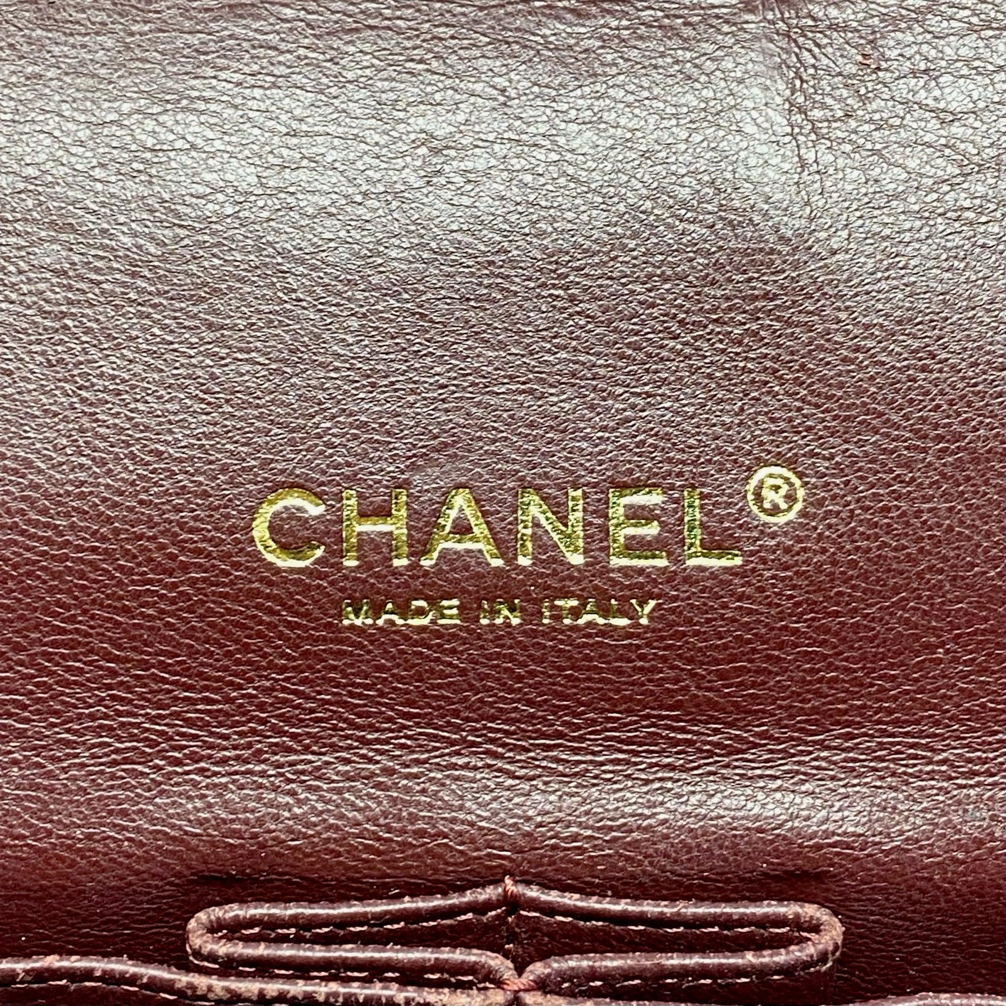 Chanel Black Lambskin Maxi Classic Flap Bag - Luxury Designer Handbag for Women | Perfect for Evening Events, Parties & Special Occasions