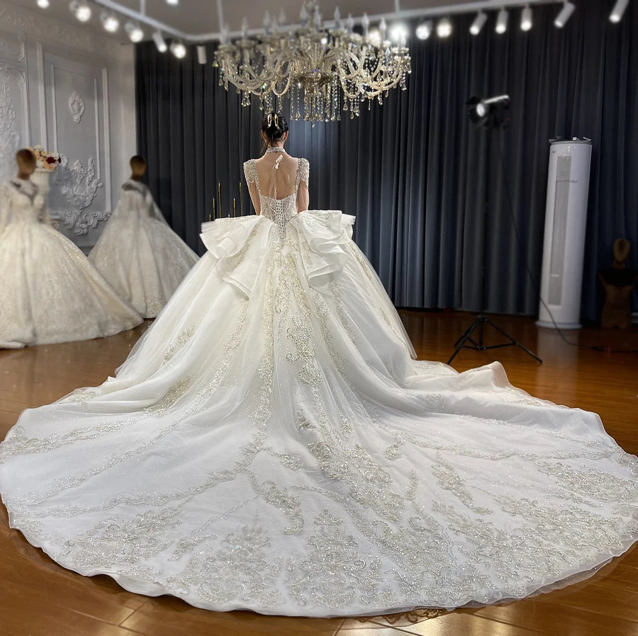 Elegant V-Neck Long Sleeve Ball Gown Wedding Dress with Ruffles - Perfect for Bridal, Formal Events & Special Occasions