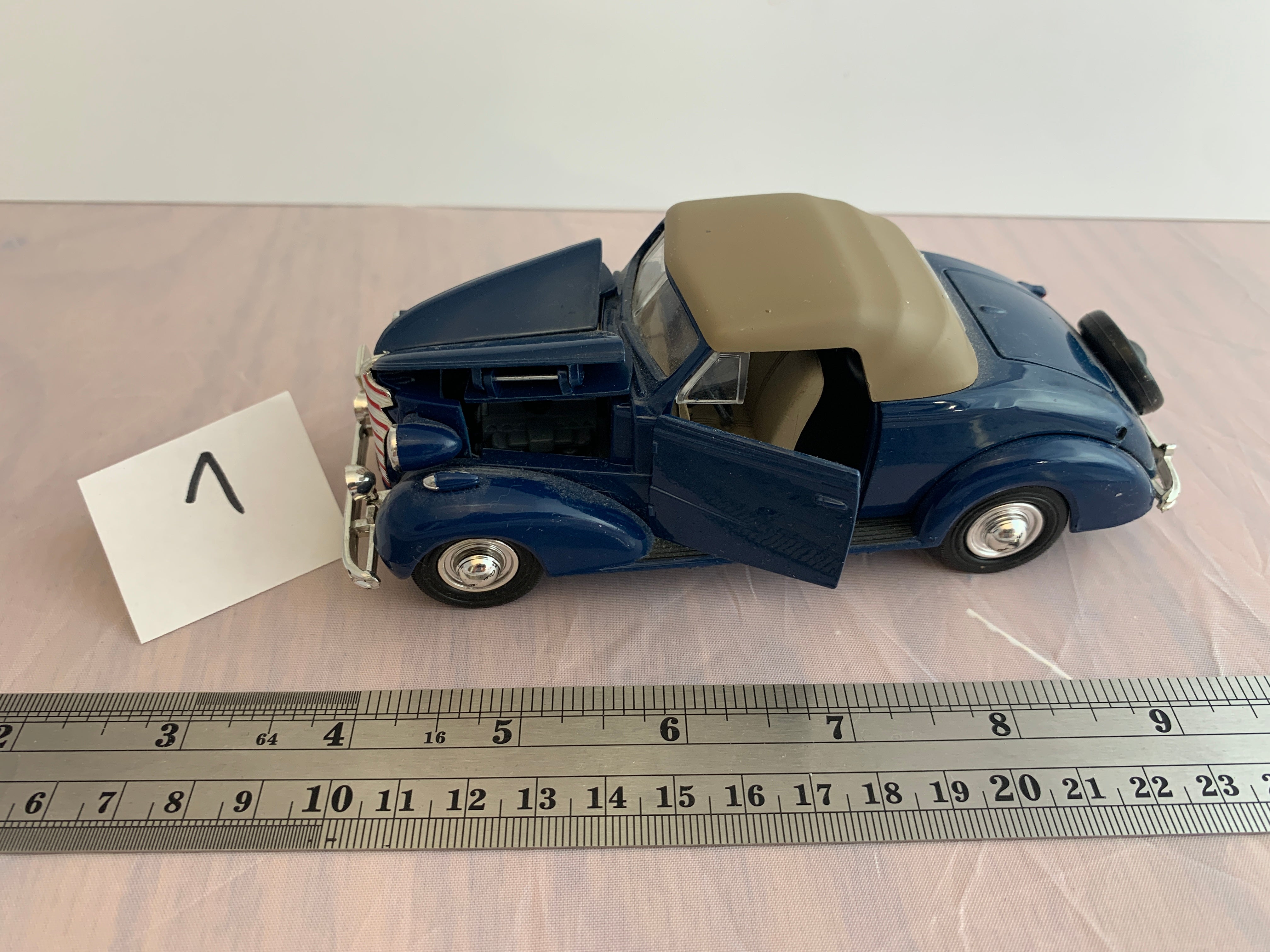 1938 Chevrolet Master Convertible Diecast Model Car by New Ray SS 55043 - Perfect for Collectors, Display, and Vintage Car Enthusiasts