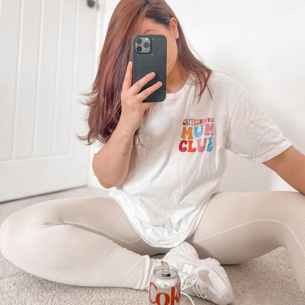 Caffeinated Mum Club Women's T-Shirt - Funny Coffee Lover Graphic Tee for Moms - Perfect for School Runs, Mom Groups & Relaxing at Home