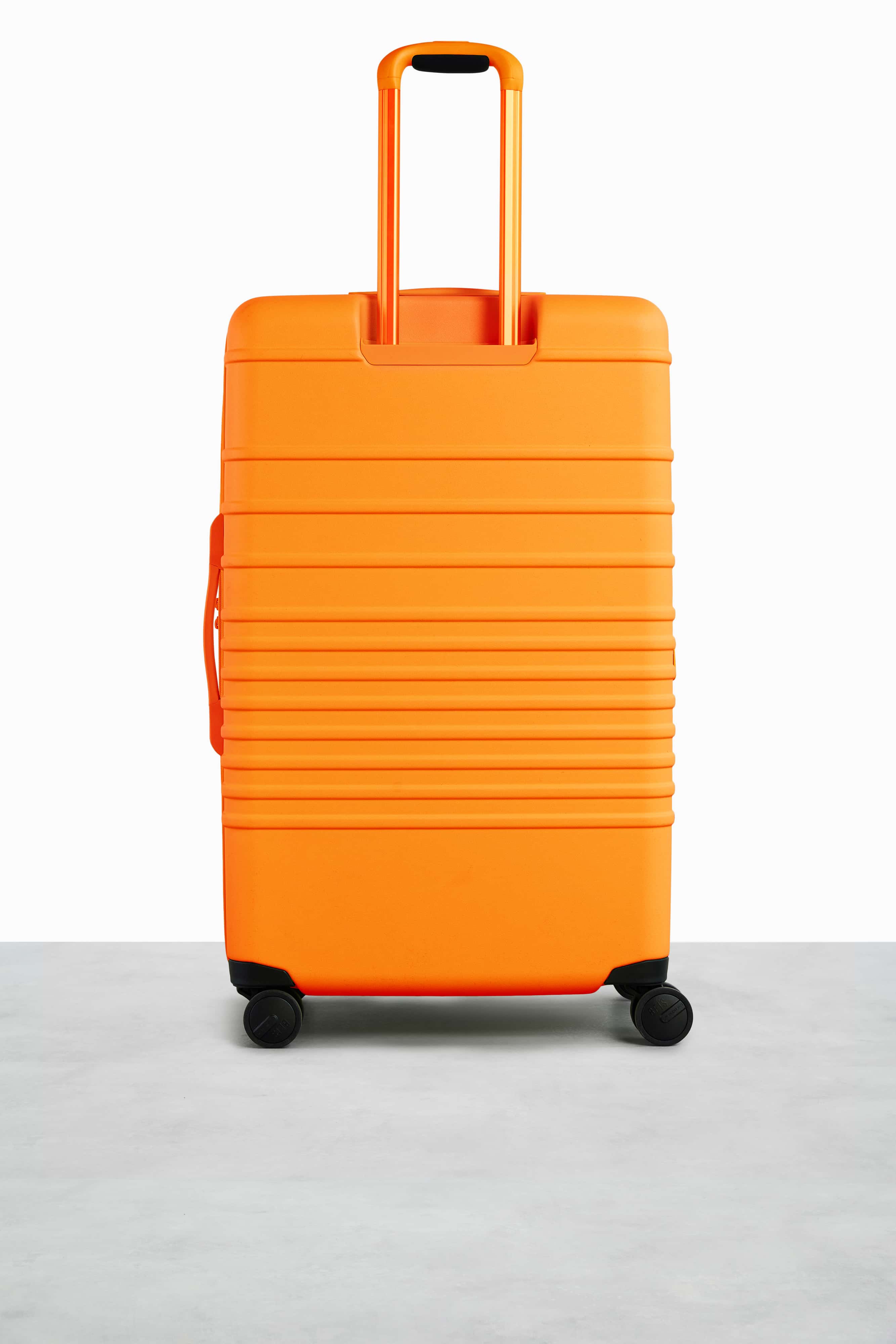 Large Check-In Roller Suitcase in Creamsicle - Spacious & Durable Travel Luggage for Airlines, Vacations & Business Trips