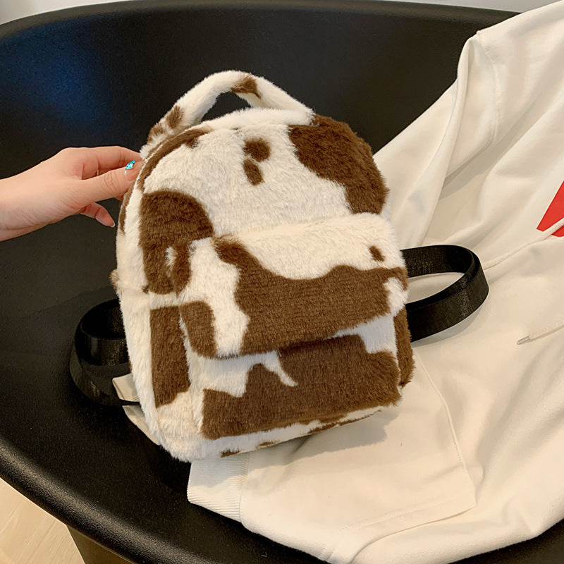 Adorable Cow Print Furry Backpack for Women - Small Cute Shoulder Bag for School, Travel & Daily Use