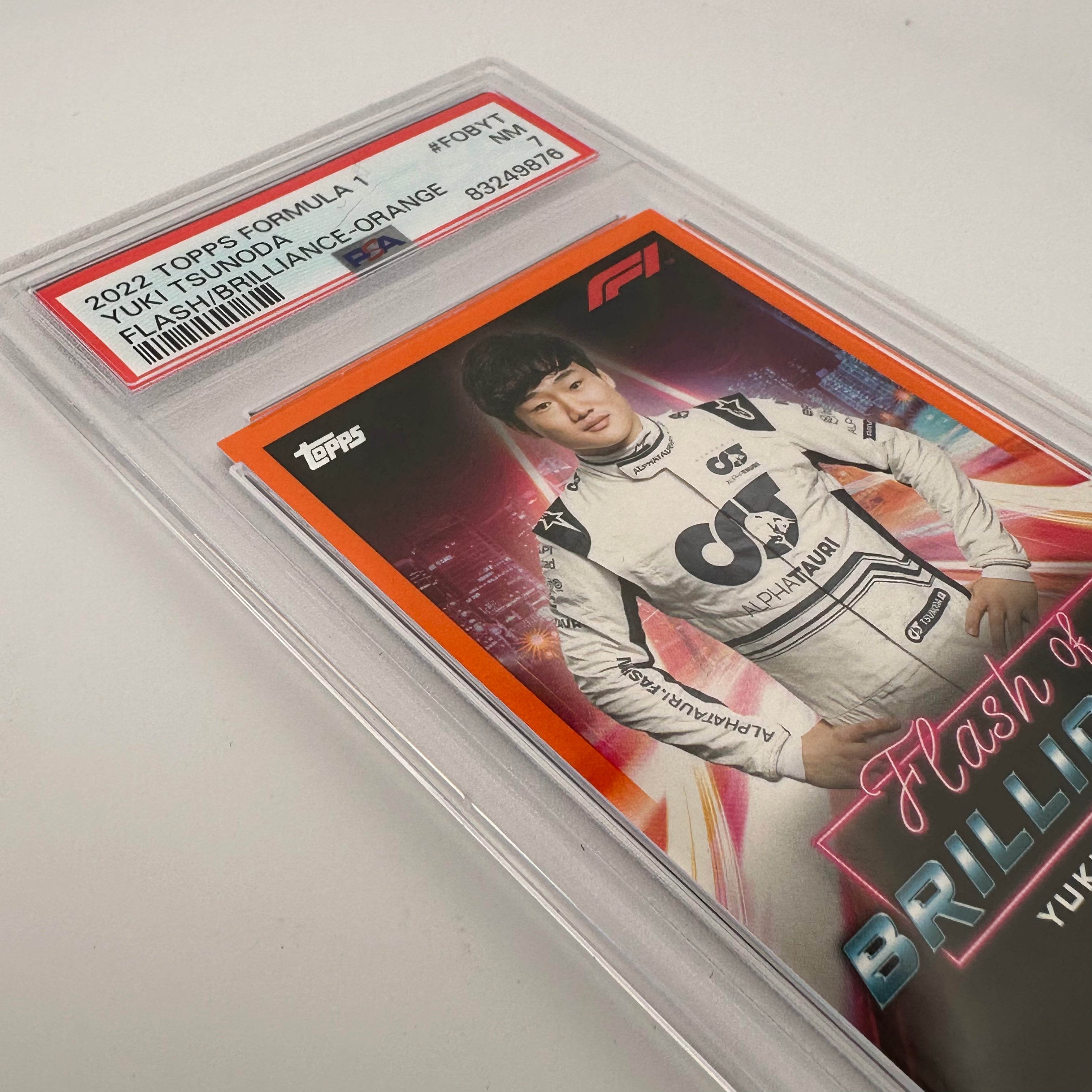 PSA 7 Yuki Tsunoda #FOBYT Flash Of Brilliance Orange Trading Card 23/25 - Perfect for Collectors, Sports Memorabilia Enthusiasts & F1 Racing Fans Display