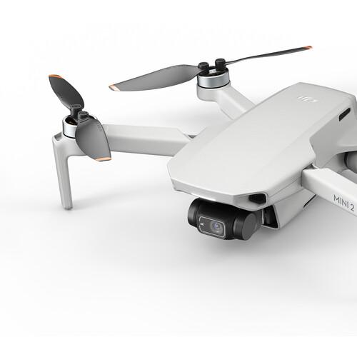 DJI Mini 2 Fly More Combo - Lightweight & Foldable Drone with 4K Camera, 31 Min Flight Time, OcuSync 2.0 Transmission - Perfect for Aerial Photography, Travel Adventures & Content Creation