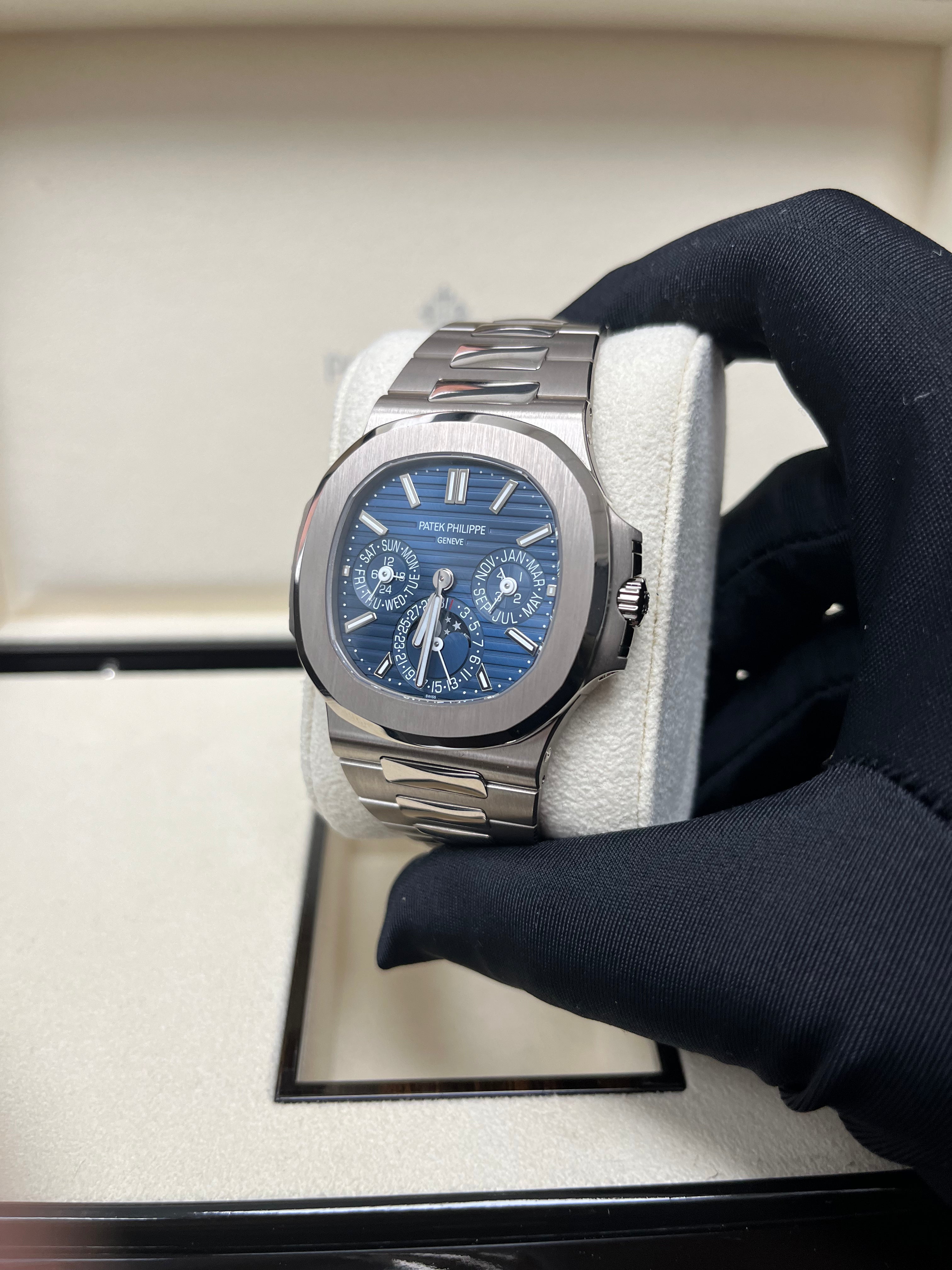 Patek Philippe Nautilus Perpetual Calendar Watch - 18K White Gold Case, Blue Sunburst Dial (Ref#5740/1G-001) | Luxury Swiss Timepiece for Men, Business Meetings & Special Occasions