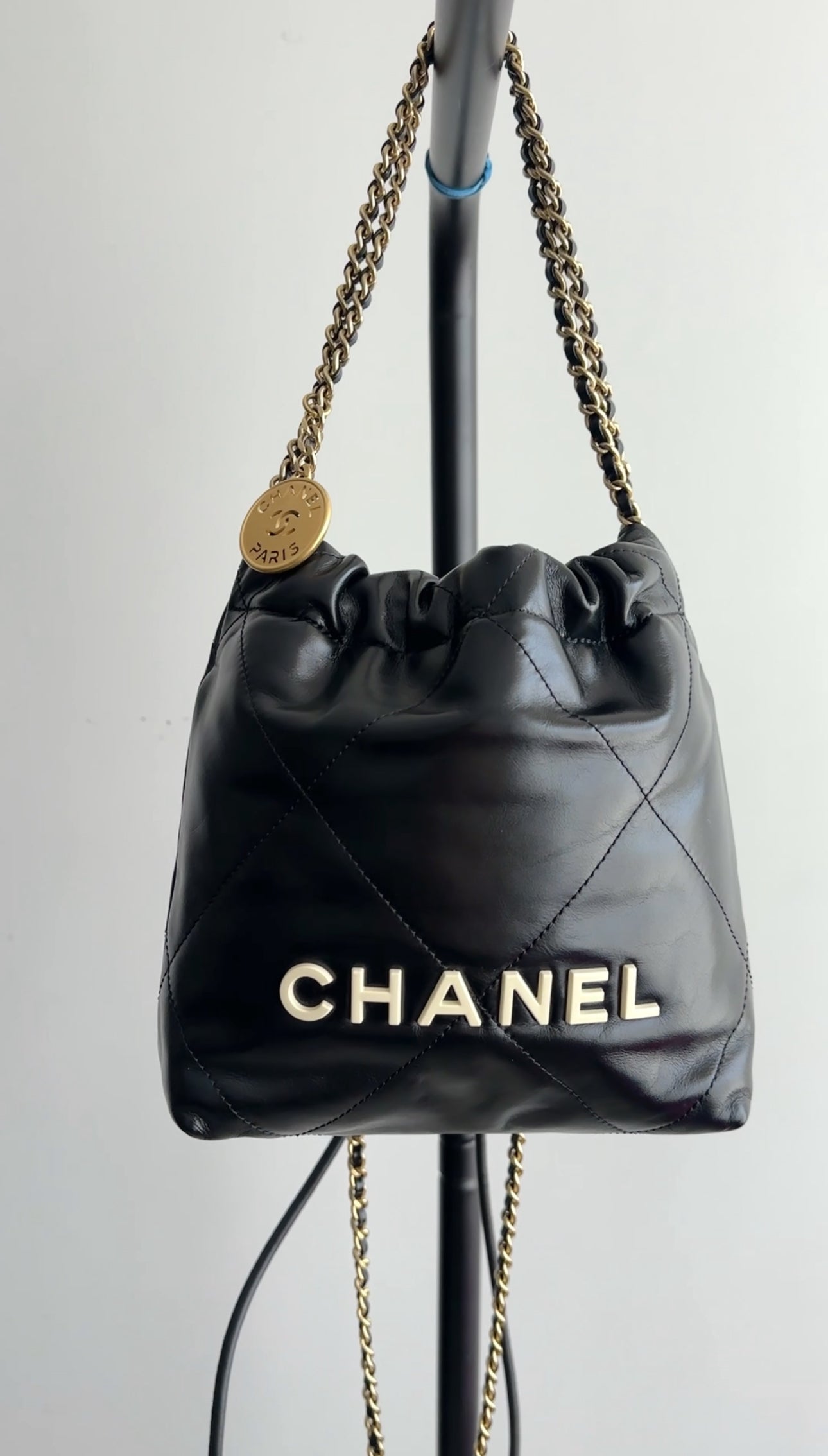 Chanel 2023 Black Leather Chain 22 Mini Bag with Ivory Enamel Logo - Luxury Designer Handbag for Women, Perfect for Evening Parties & Date Nights