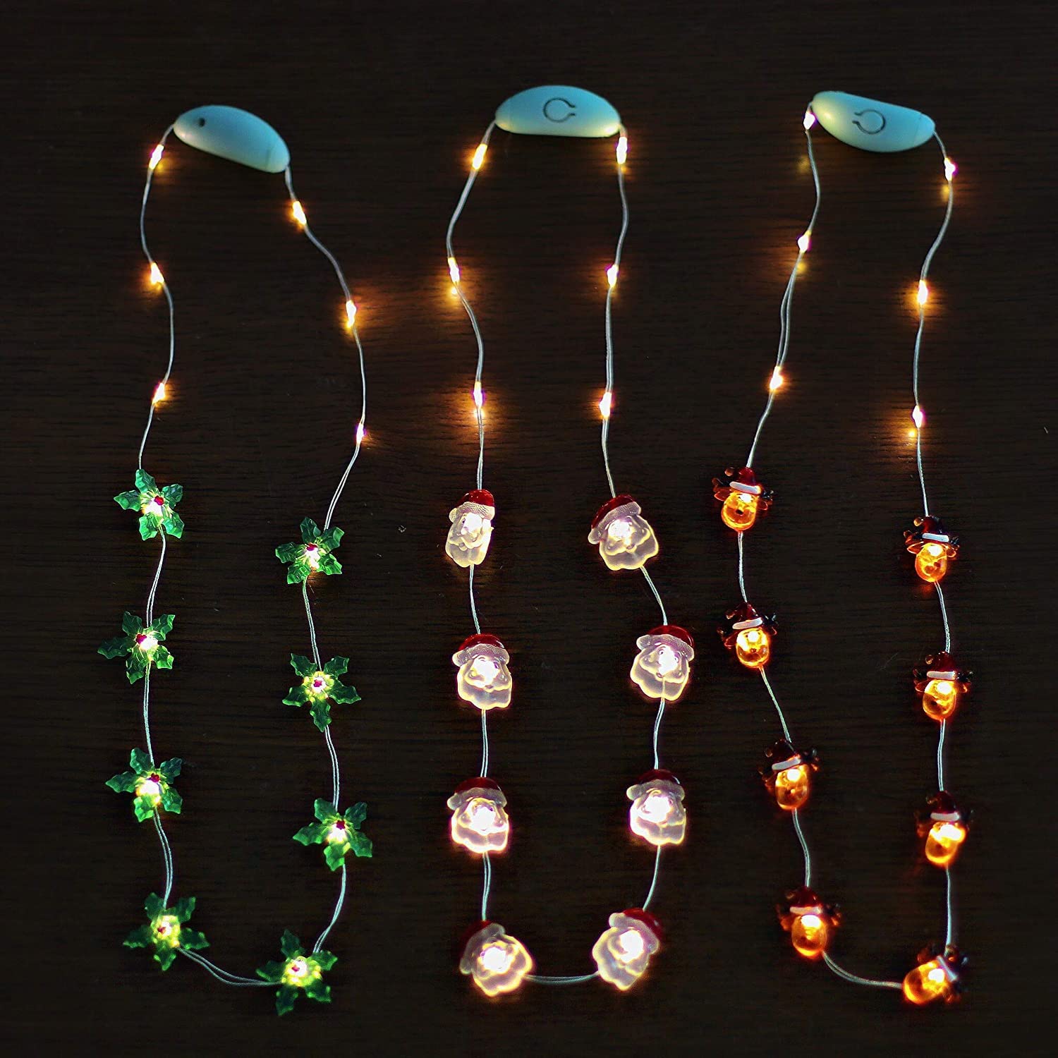 JASHIKA Christmas Party LED Necklace - Reindeer & Santa Clause Design with Green Leaves & Crystal String Lights - Perfect for Holiday Parties, Festive Decor & Gift Giving