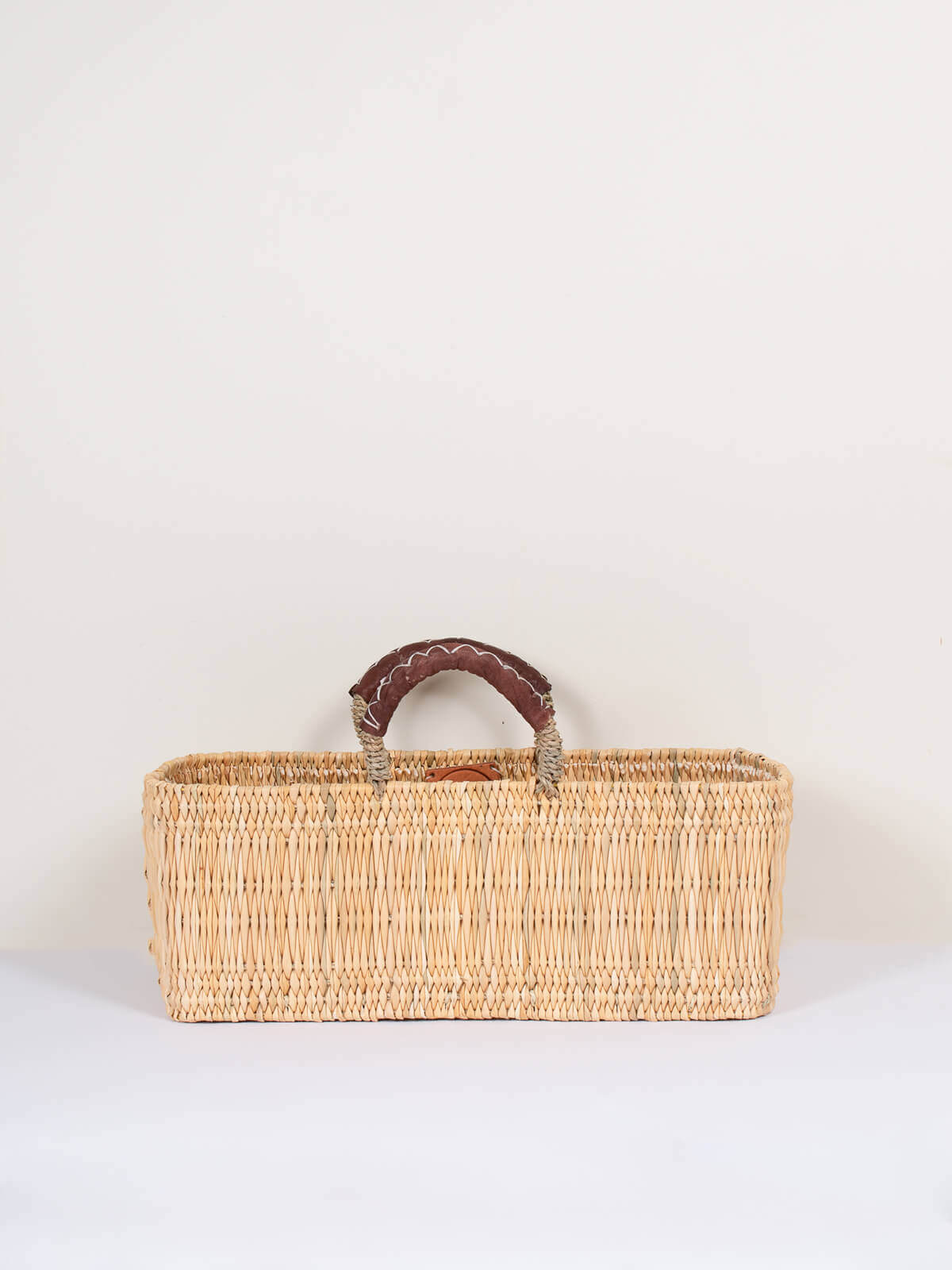 Handwoven Reed Basket with Genuine Leather Handles - Natural Woven Storage Bin for Home Decor, Laundry, or Picnic Basket - Perfect for Organizing Blankets, Toys, and More