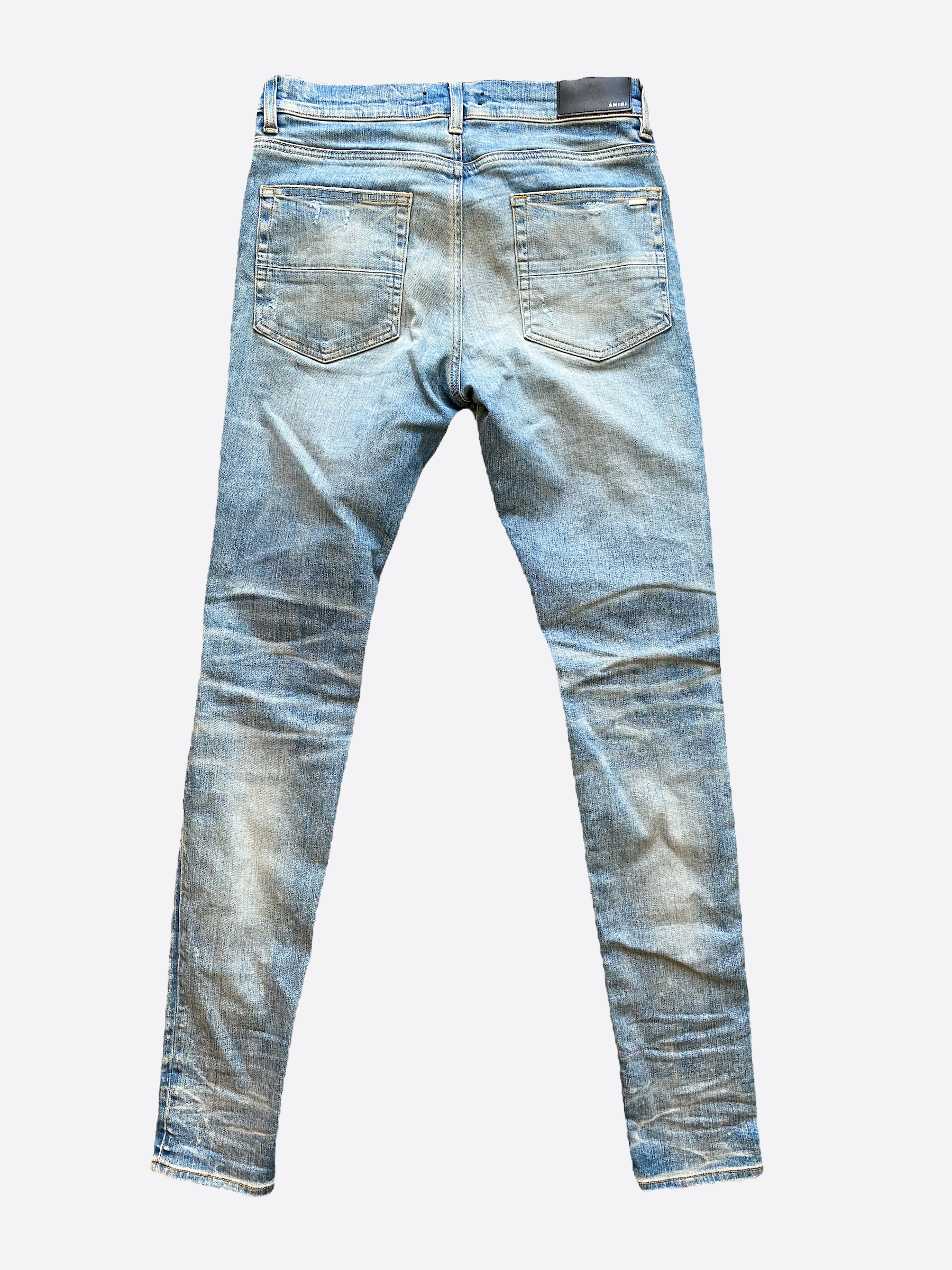 Amiri Logo Applique Blue Distressed Denim Jeans for Men - Stylish Vintage Washed Slim Fit Designer Jeans | Perfect for Casual Wear, Night Out and Street Fashion