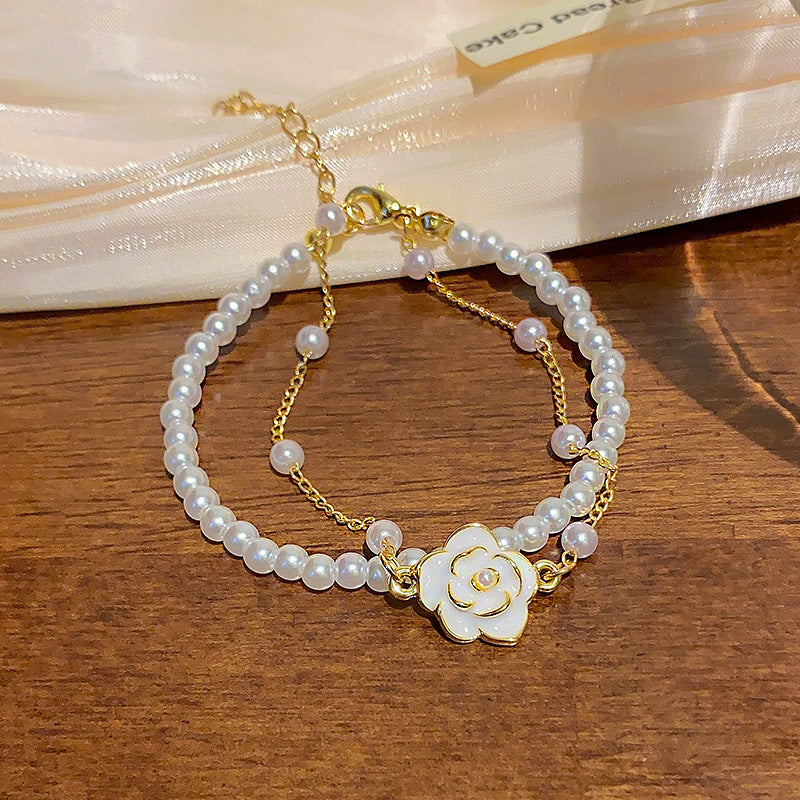 Dainty Camellia Charm Ivory Pearl Bracelet for Women | Elegant Adjustable Fashion Jewelry Gift | Perfect for Weddings, Parties & Everyday Wear | HB1205