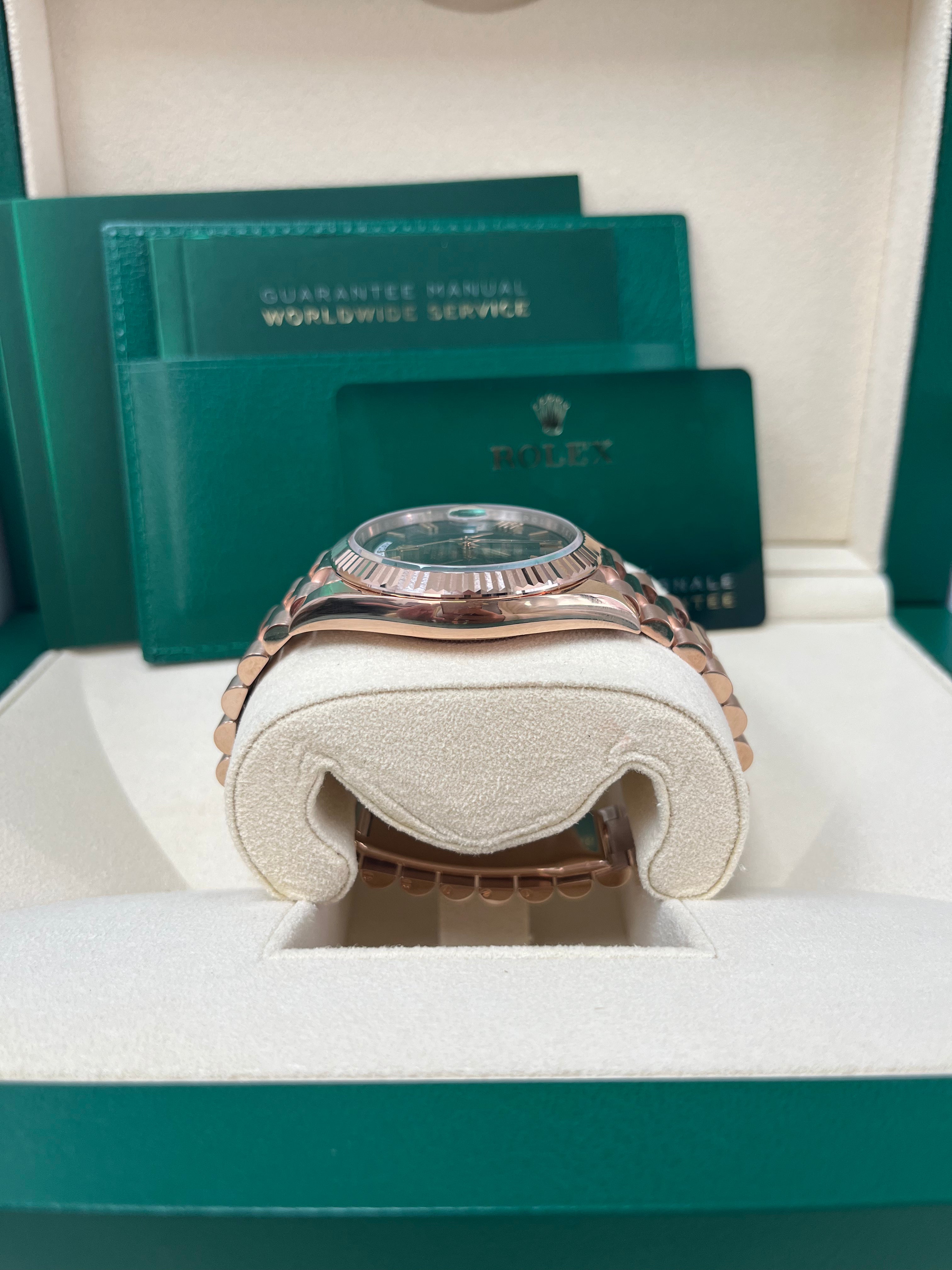 Rolex Day Date 40 Rose Gold Watch with Green Roman Dial & Fluted Bezel (Ref#228235) - Luxury Dress Watch for Business & Formal Occasions