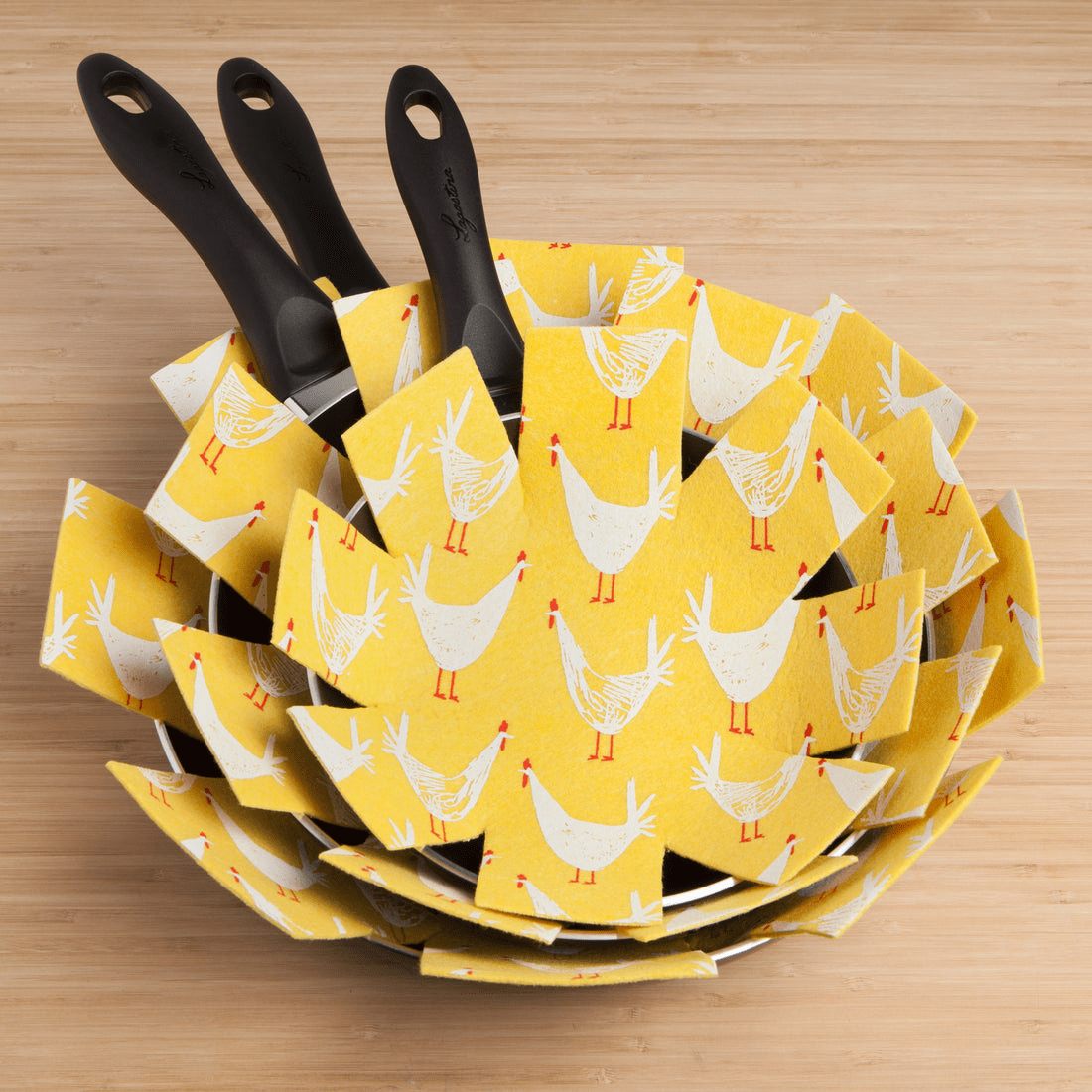 Now Designs Chicken Scratch Pan Protectors Set of 3 - Non-Slip Silicone Pot Holders for Kitchen, Stovetop & Oven Use - Heat Resistant & Durable for Cooking, Baking & Serving