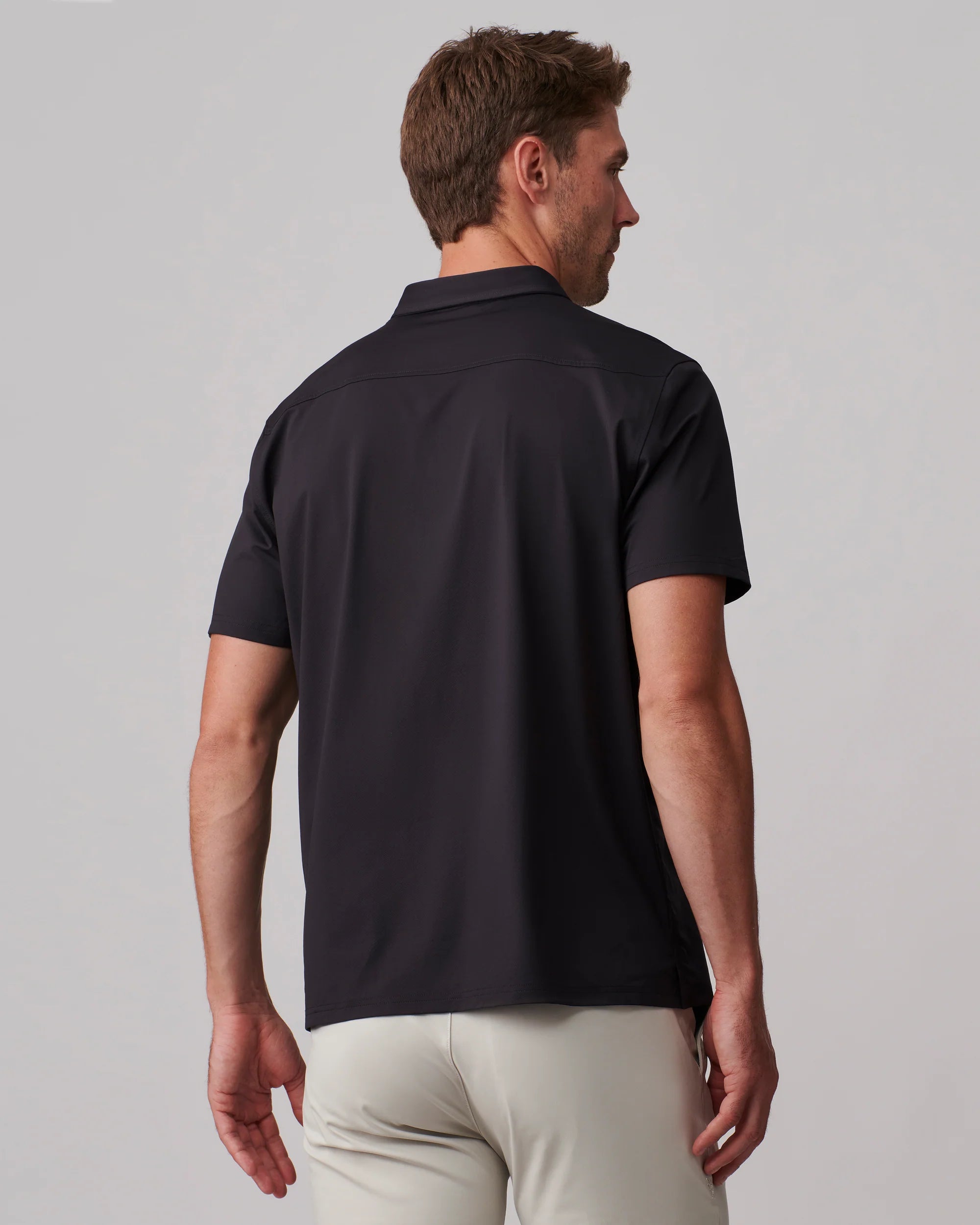 Rhone Men's Commuter Polo Shirt - Moisture Wicking, Breathable & Odor Resistant Performance Shirt for Work & Travel | Black