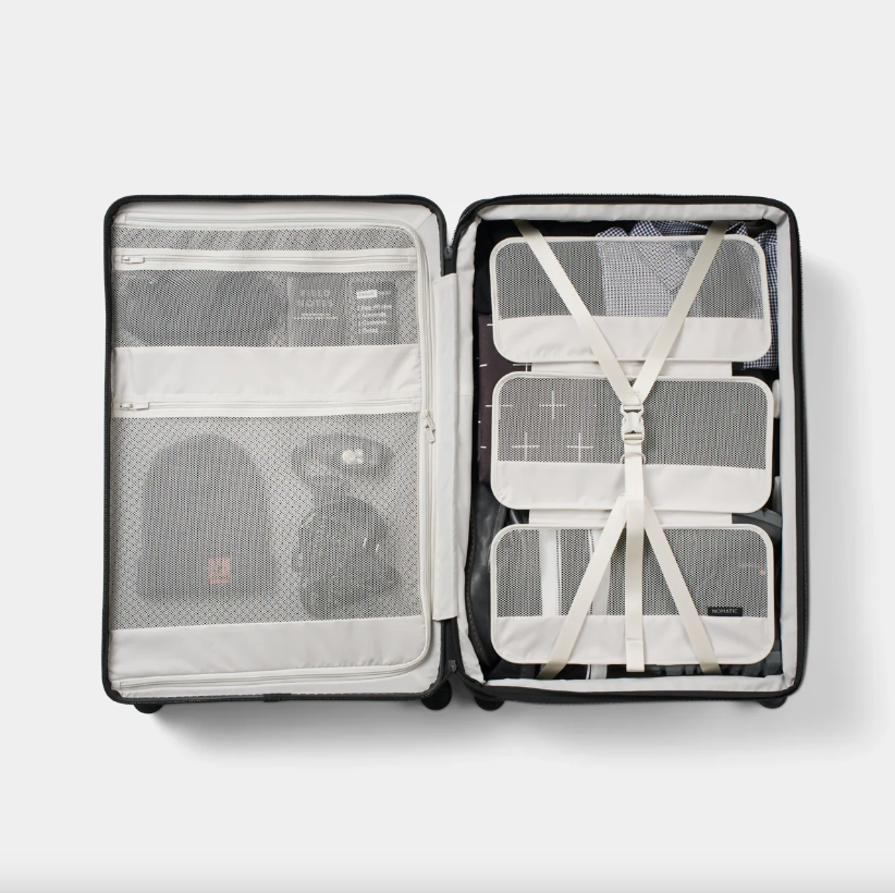 Nomatic Method Check-In Luggage - Durable Carry-On Suitcase for Travel, Business & Vacation - TSA Approved Spinner Bag with Expandable Storage