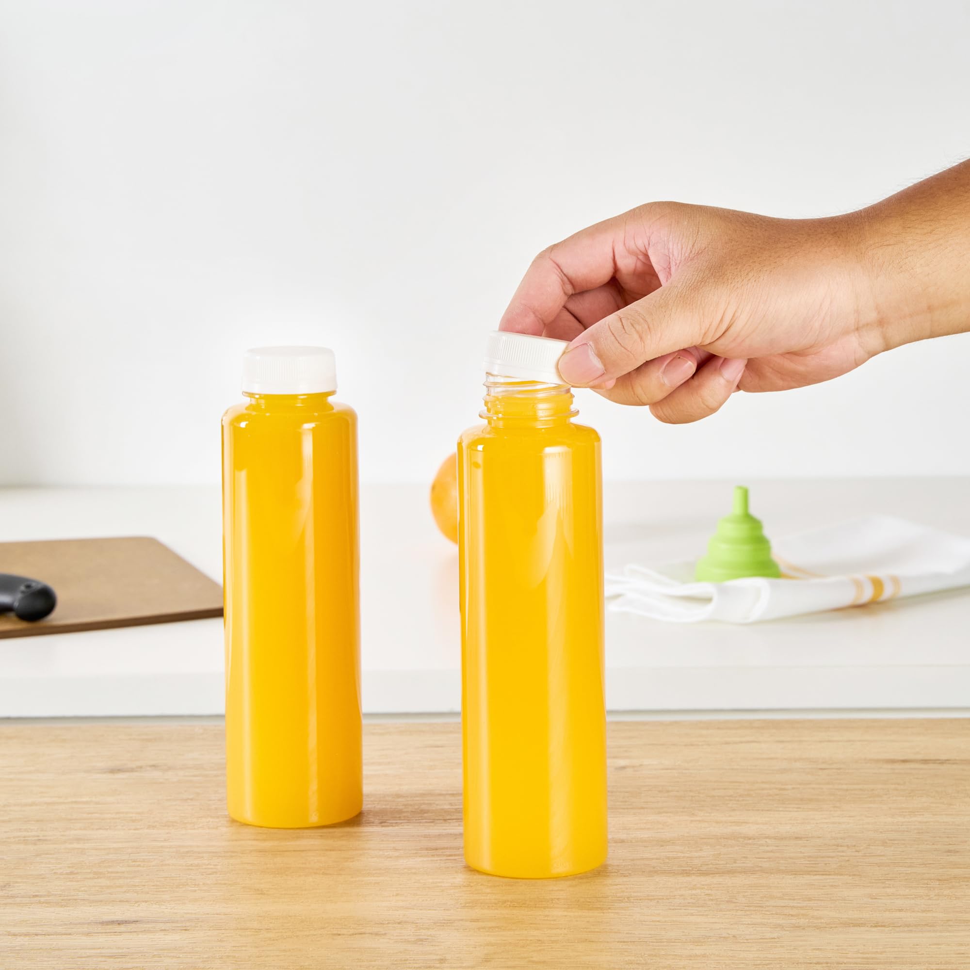 16oz Clear Plastic Juice Bottles with White Caps - 100 Pack Disposable Round Juice Containers for Juicing, Smoothies, Cold Brew & Beverages - Perfect for Juice Shops, Cafes, Restaurants & Home Use