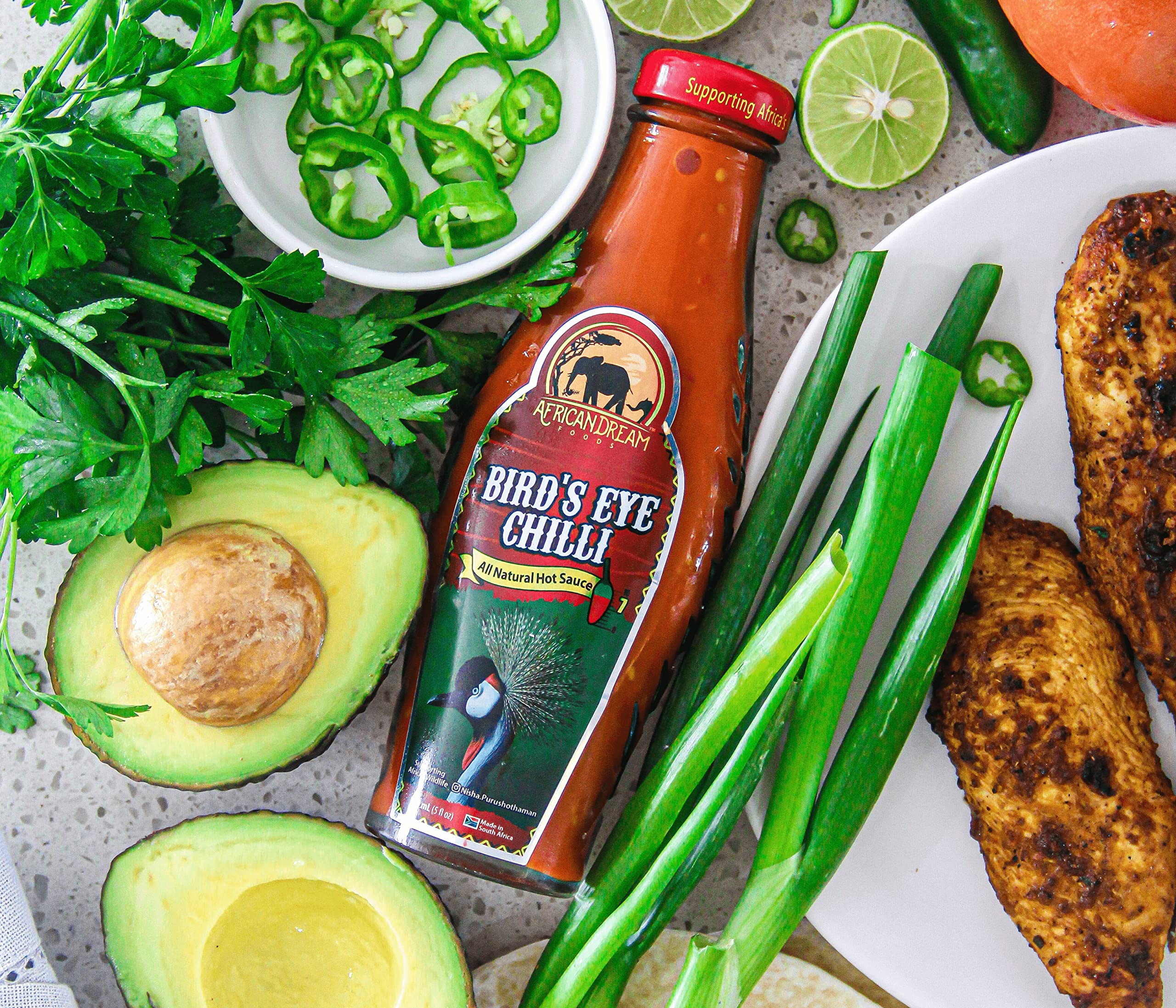 African Dream Foods Bird's Eye Chilli Hot Sauce - Bold & Fiery Flavor, Vegan, Non-GMO, 5 fl oz Glass Bottle - Perfect for Wings, Tacos, Pizza & Spicy Food Lovers