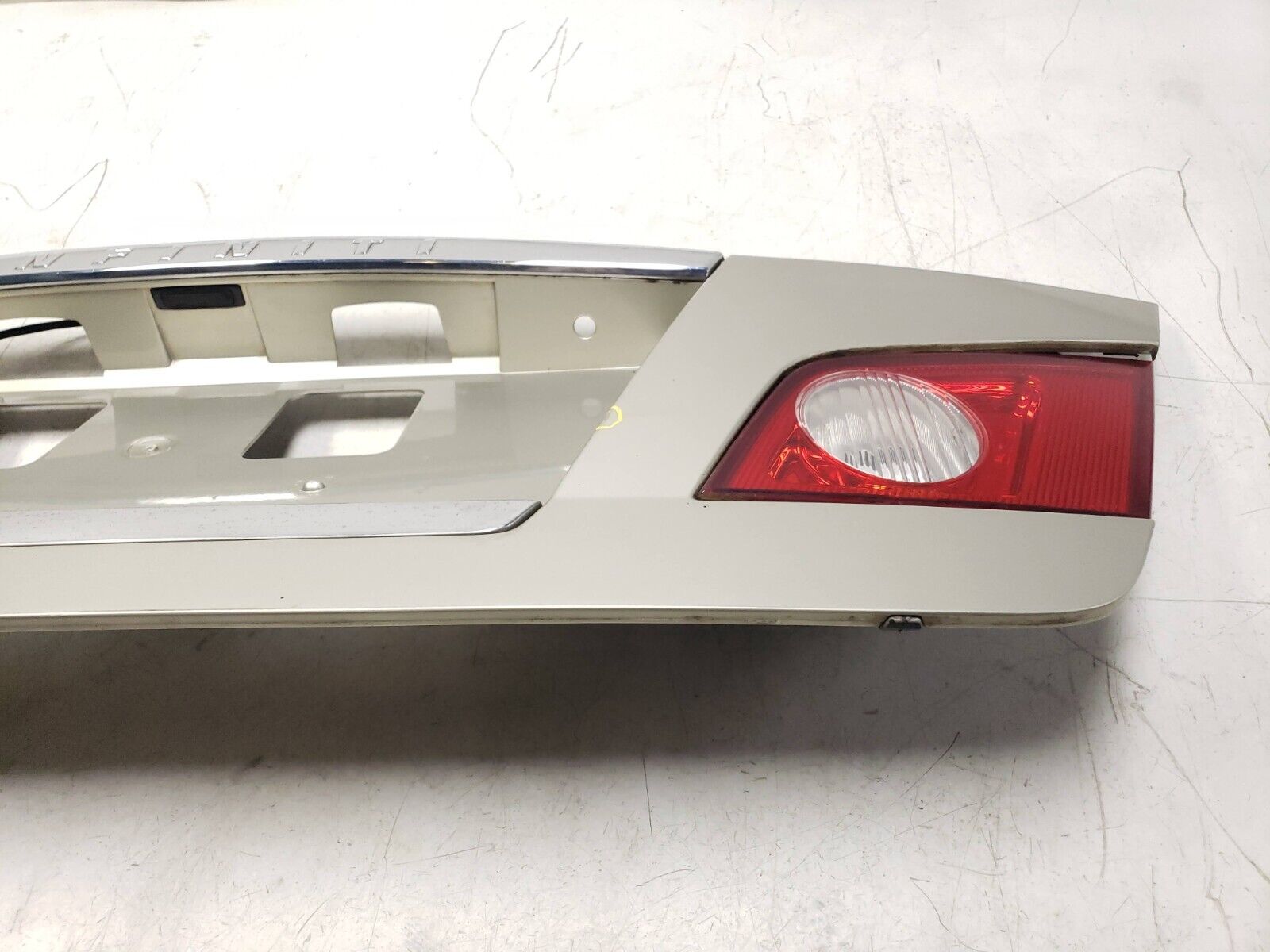 06-09 Infiniti M35 Trunk Trim Molding & License Plate Panel - OEM Replacement Part for Car Body Repair & Customization