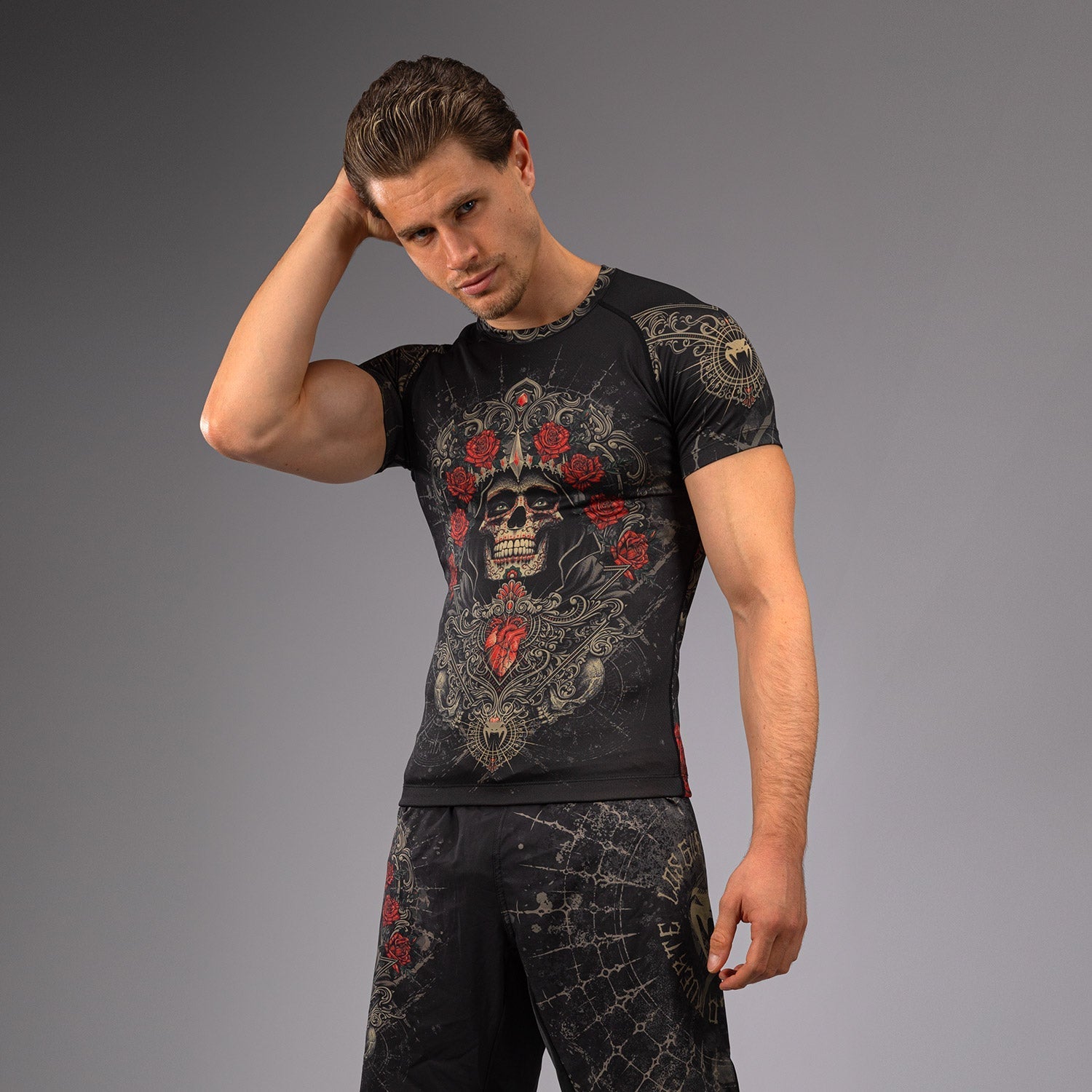 Venum Santa Muerte 5.0 Men's Short Sleeve Rashguard - Deep Black & Gold MMA Rash Guard for BJJ, MMA & Training - Moisture Wicking & UV Protection