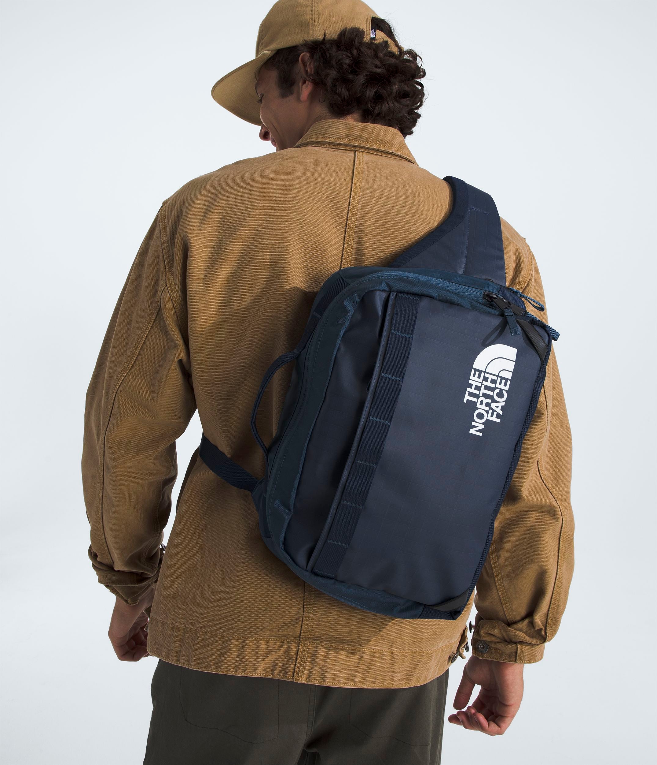 The North Face Base Camp Voyager Sling Bag - Durable Travel & Hiking Crossbody Pack for Men & Women - Perfect for Outdoor Adventures, Commuting & Daily Use