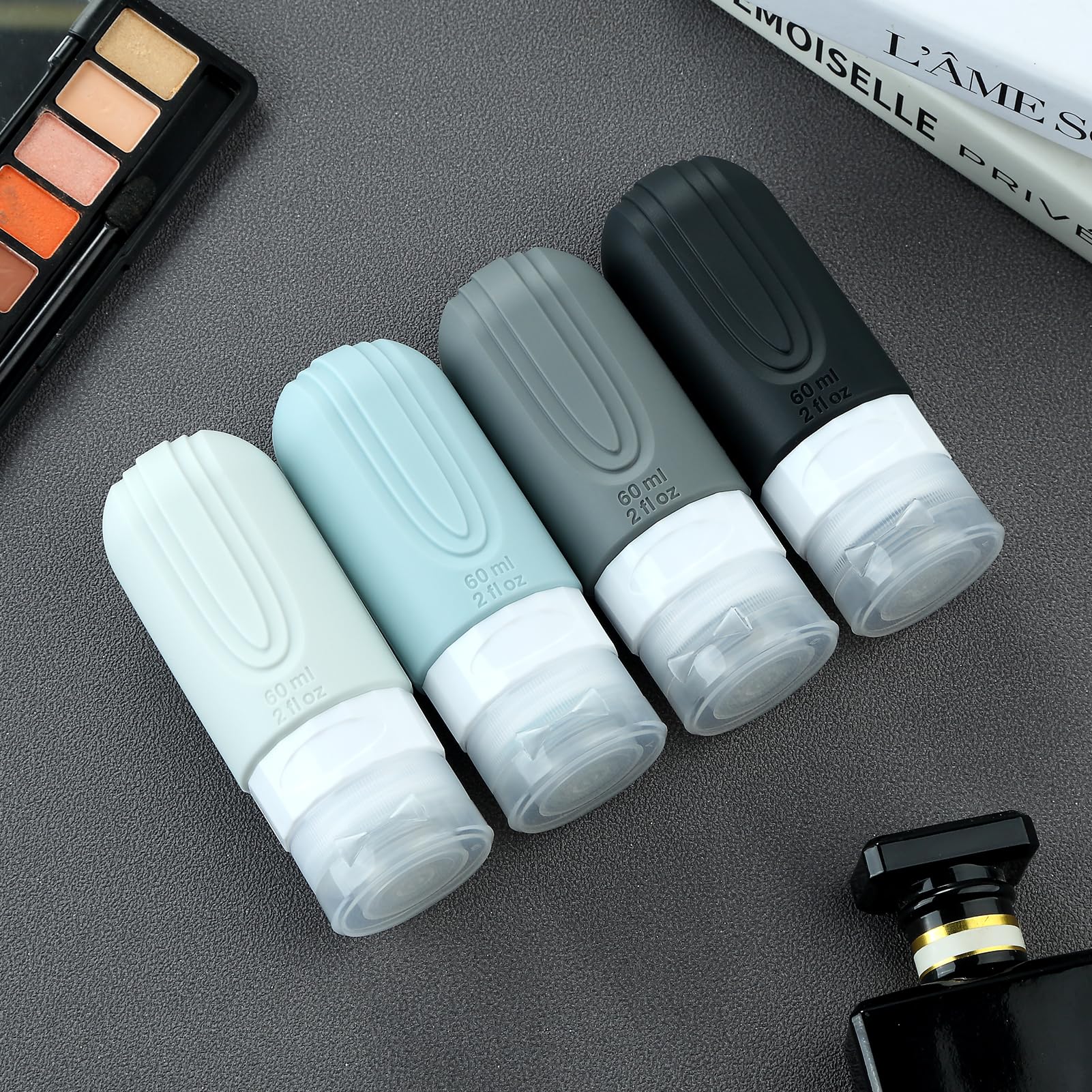 TSA Approved 2oz Travel Size Bottles (4 Pack) - BPA Free Leak Proof Toiletry Containers for Shampoo & Liquid - Refillable Travel Accessories with Toiletry Bag - Perfect for Airplane Carry On & Vacation Essentials