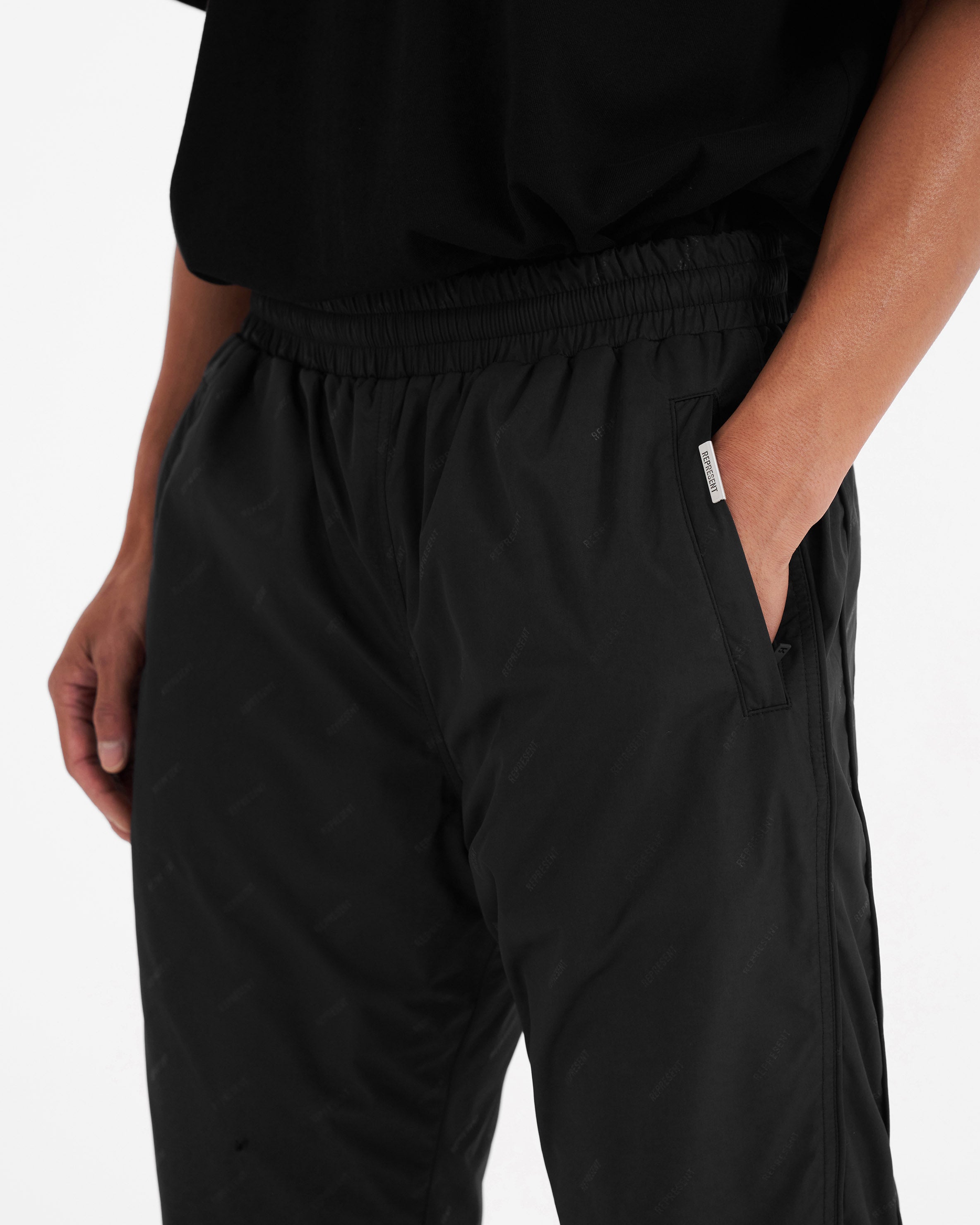 All Over Logo Trackpants for Men & Women - Black Comfortable Jogger Pants for Gym, Running & Casual Wear