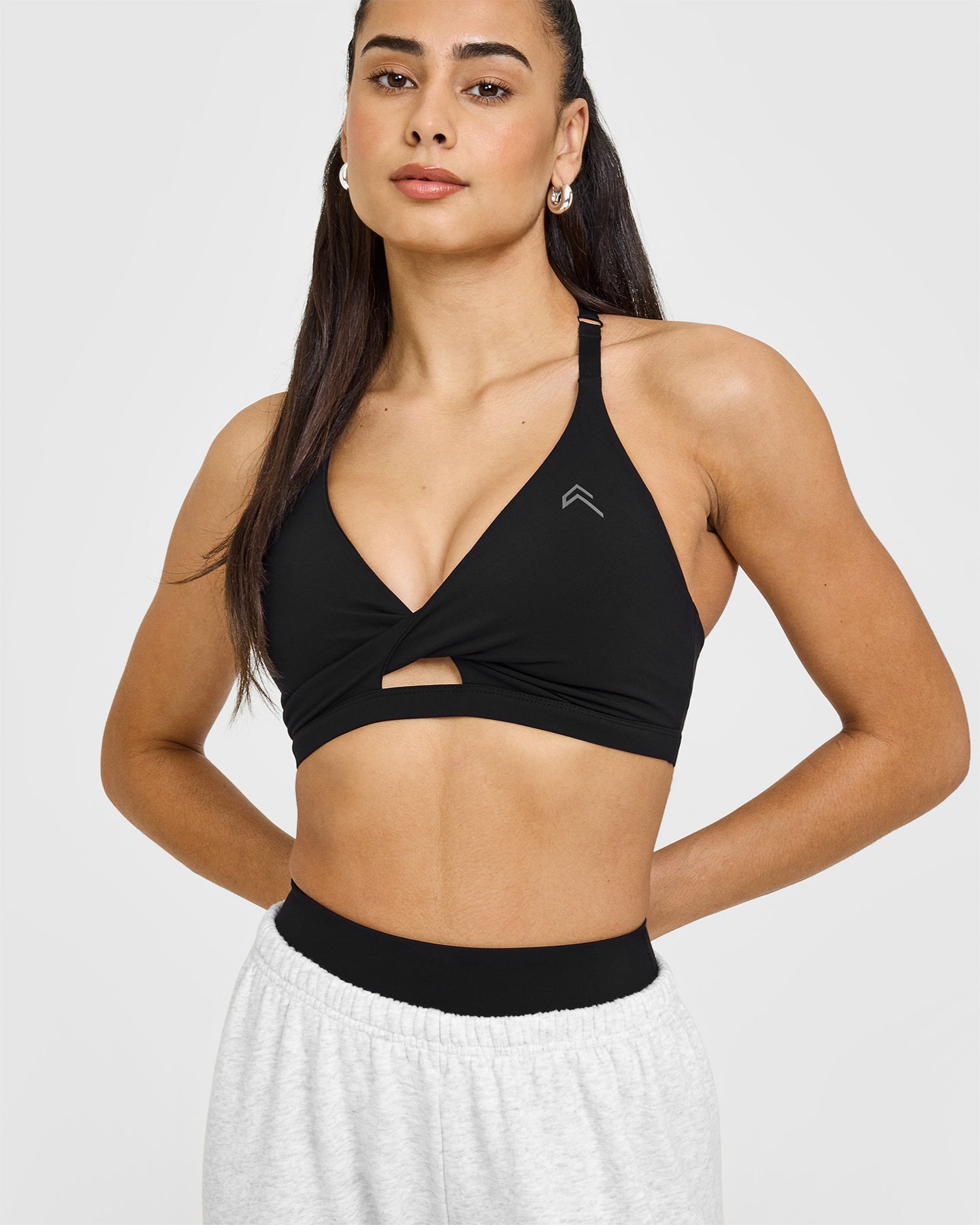 High-Performance Unified Twist Sports Bra for Women - Breathable & Supportive Workout Top in Black | Ideal for Yoga, Running & Gym