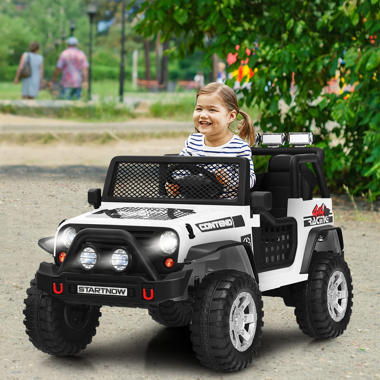 OLAKIDS 12V 2-Seat Battery Powered Electric Ride-On Truck for Kids - Remote Control Toy Car with Spring Suspension, LED Lights & Music - Perfect for Toddlers Outdoor Play & Birthday Gifts