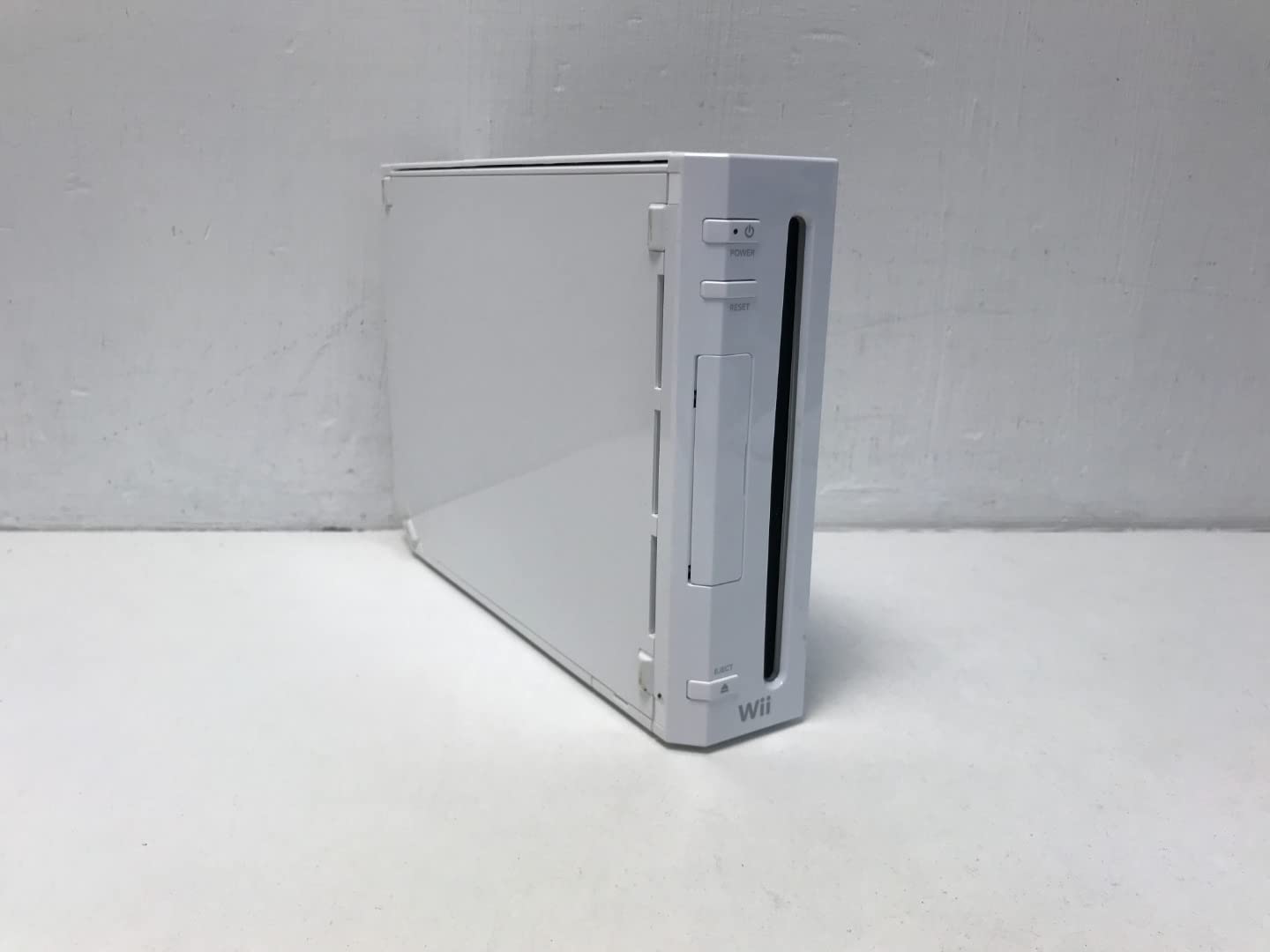 Nintendo Wii Console Bundle with Wii Sports & Wii Sports Resort Games - Includes Motion Plus Controller - Perfect for Family Fun & Multiplayer Gaming