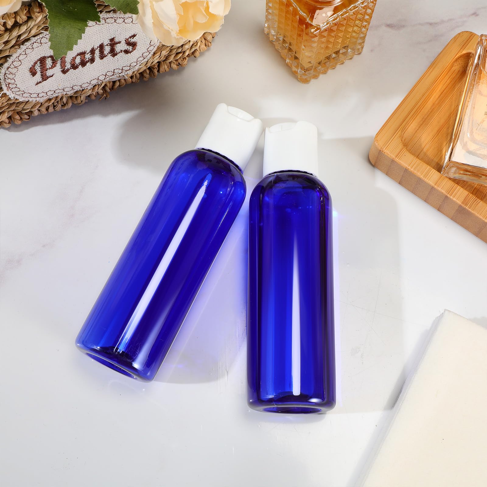 50 Pcs 4oz Empty Plastic Travel Bottles with Leak-Proof Disc Top Flip Cap - Small Refillable Containers for Shampoo, Lotion, Body Wash & Toiletries - Perfect for Air Travel, Camping & Gym Essentials (Blue)