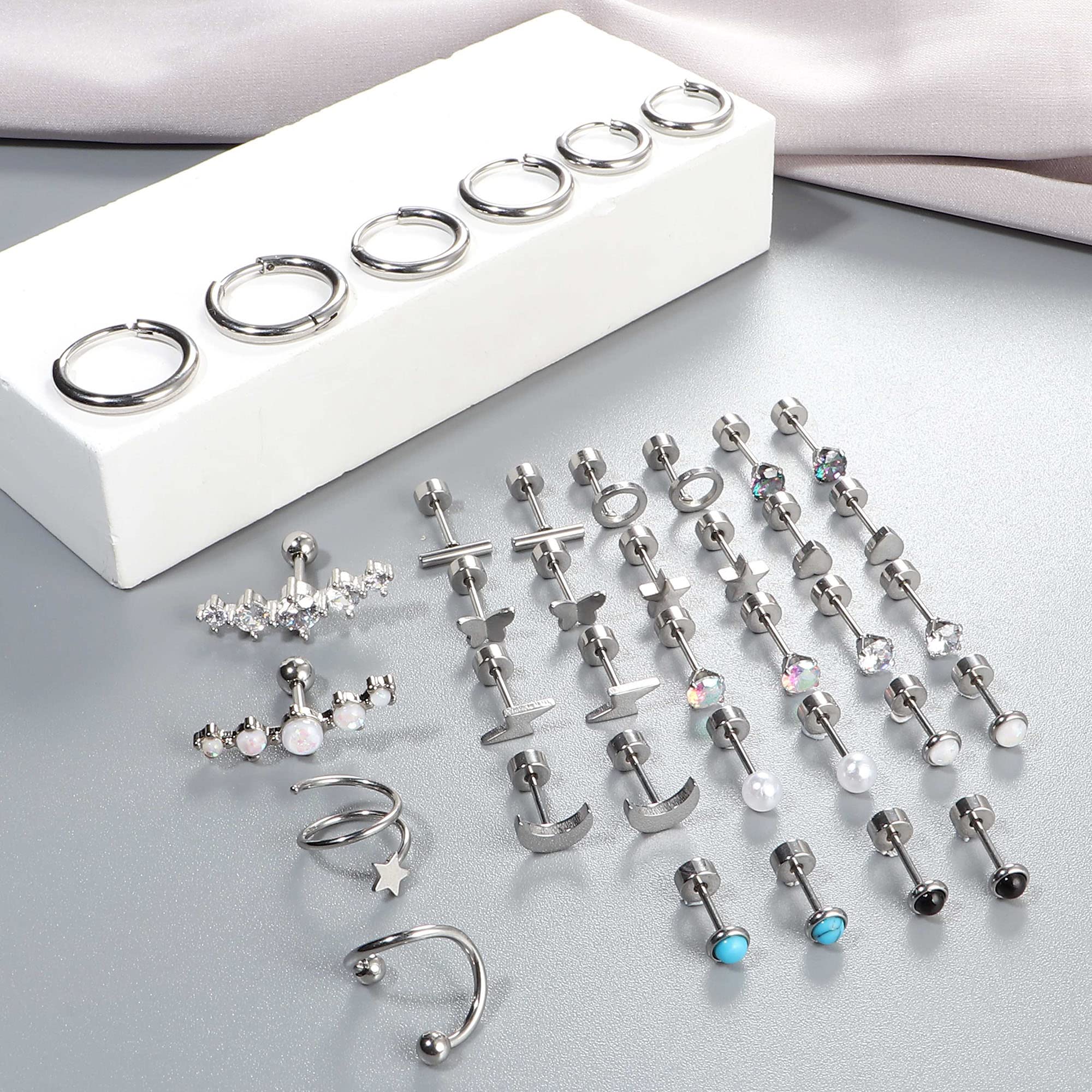 JeweBella 19 Pairs Hypoallergenic Surgical Steel Earrings - Flat Back Studs, Hoops & Cartilage Sleepers for Women & Men | Opal & Zirconia Small Earring Set for Multiple Piercings | Perfect for Daily Wear, Gifts & Piercing Stacks