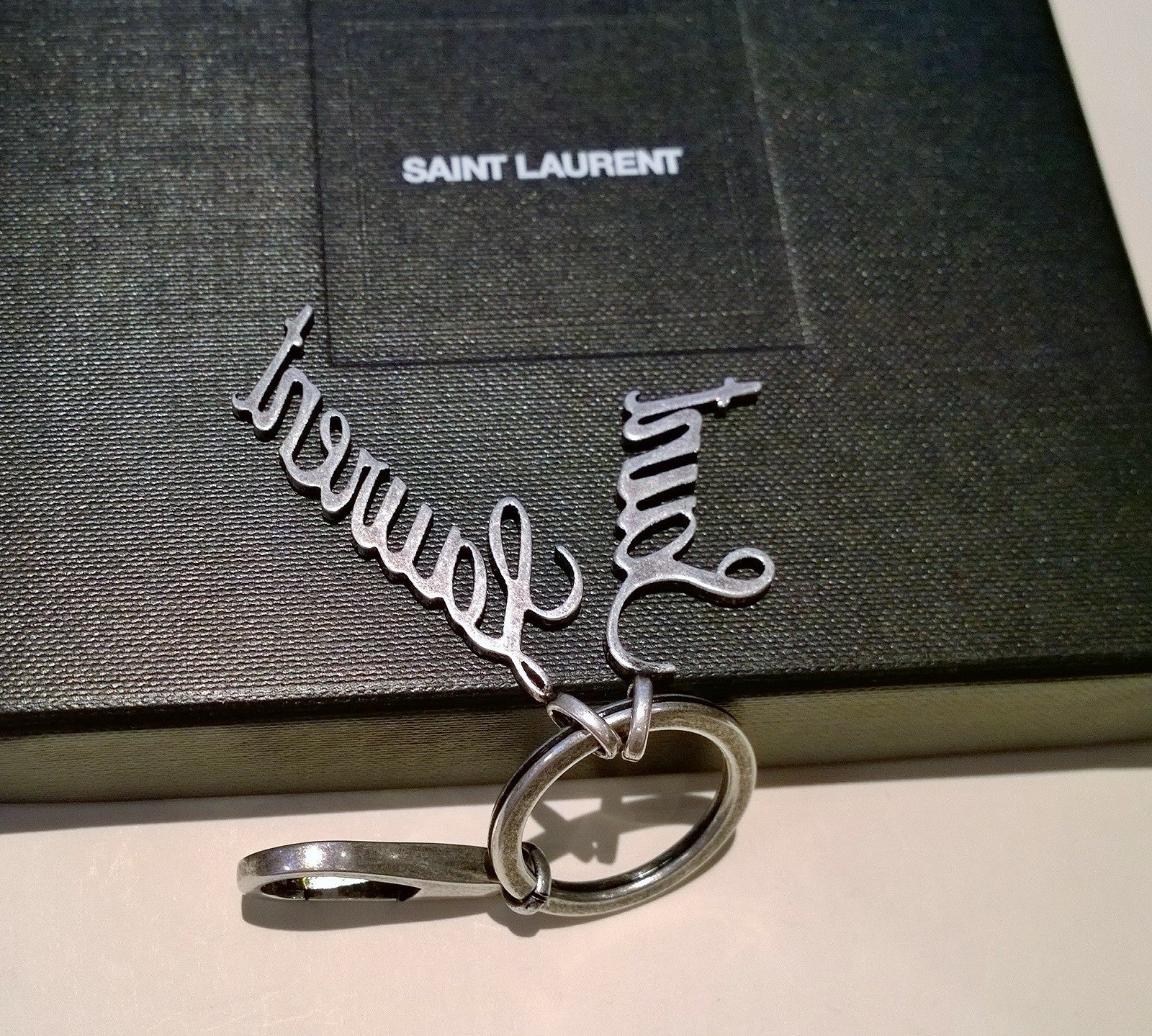 Saint Laurent Oxidized Silver Logo Key Ring Bag Charm - Luxury Designer Keychain for Women & Men - Perfect for Handbags, Backpacks, and Gift Giving
