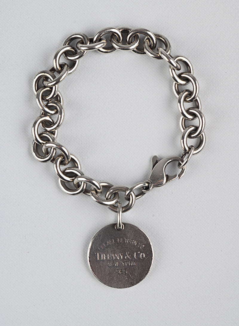 Tiffany & Co. Sterling Silver Bracelet with Round Charm - Elegant Jewelry Gift for Women, Perfect for Anniversaries & Special Occasions