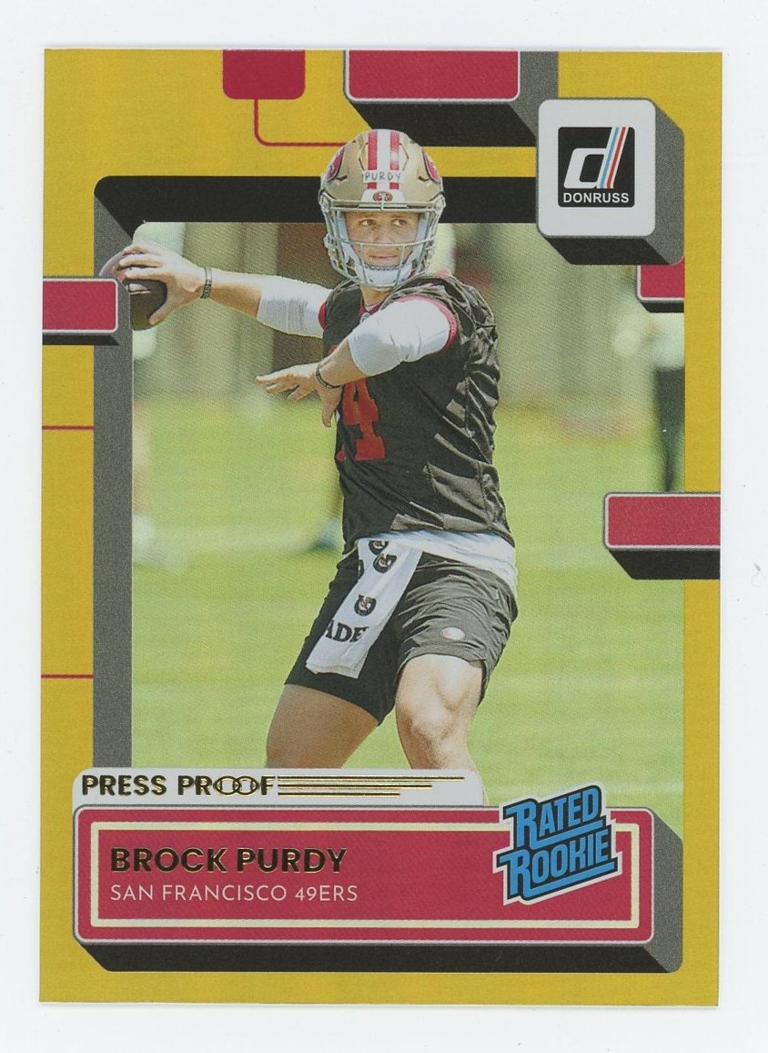 2022 Panini Donruss Brock Purdy Gold Press Proof Rated Rookie Football Card - Collectible Sports Memorabilia for NFL Fans and Trading Card Enthusiasts