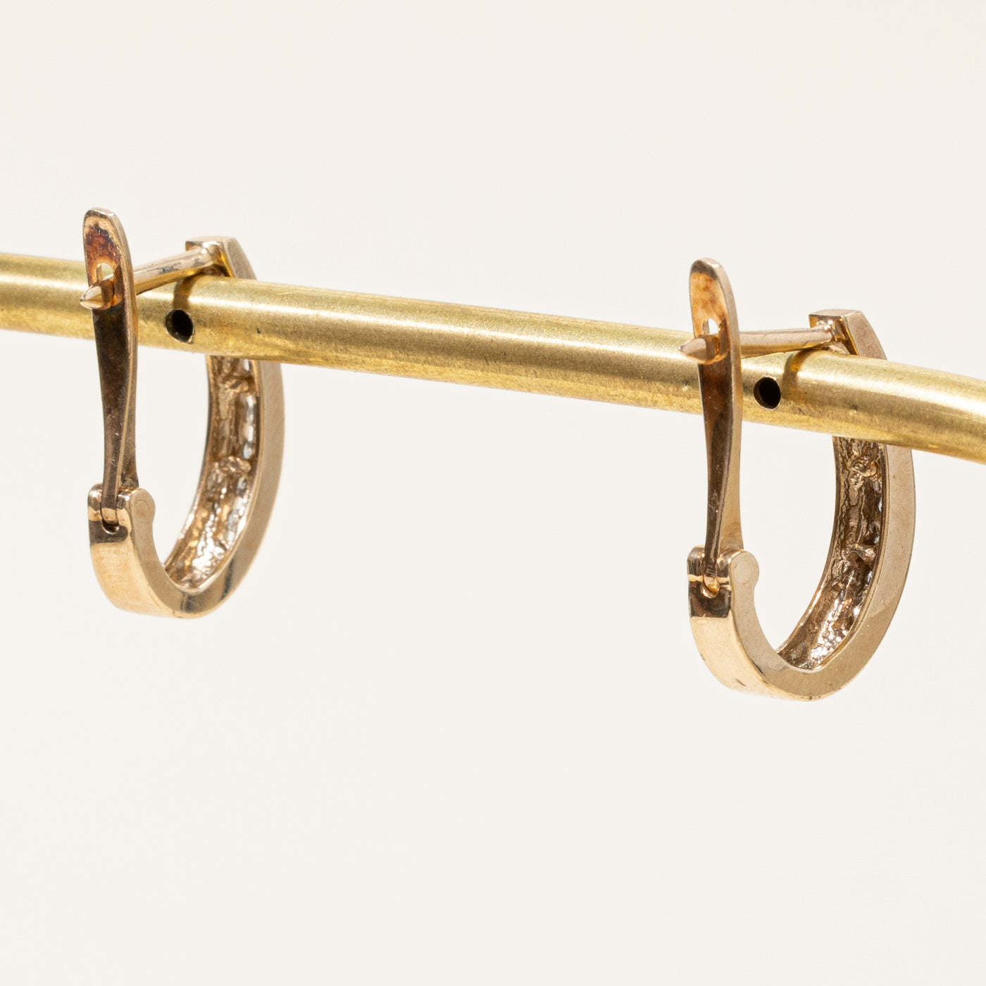 0.14ctw Diamond Oval Huggie Earrings for Women - 14K Gold Hoop Earrings for Everyday Wear & Special Occasions