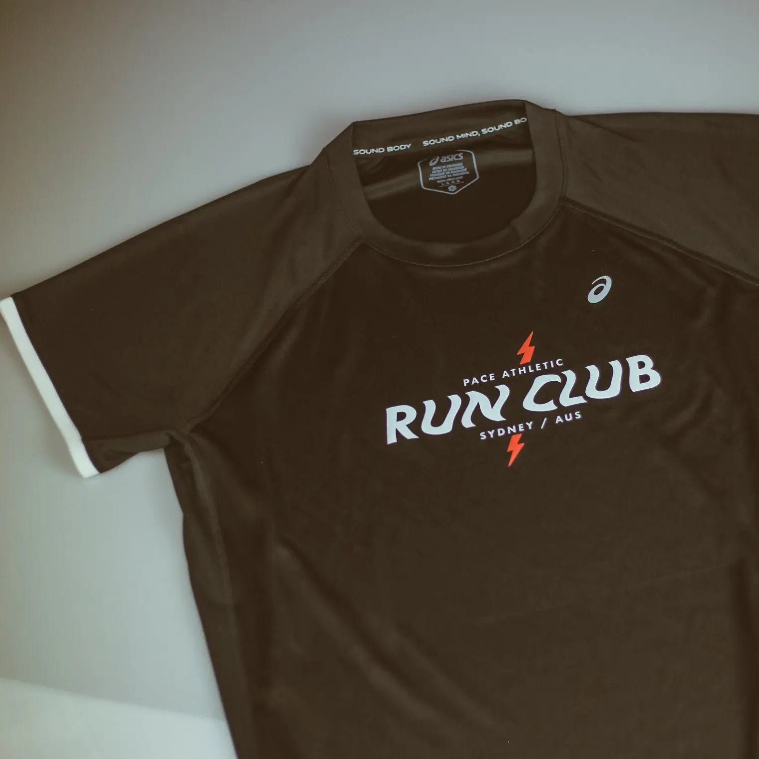 ASICS x Run Club Women's Performance Short Sleeve Running Top - Black | Lightweight Moisture-Wicking Workout Shirt for Gym, Jogging & Outdoor Activities