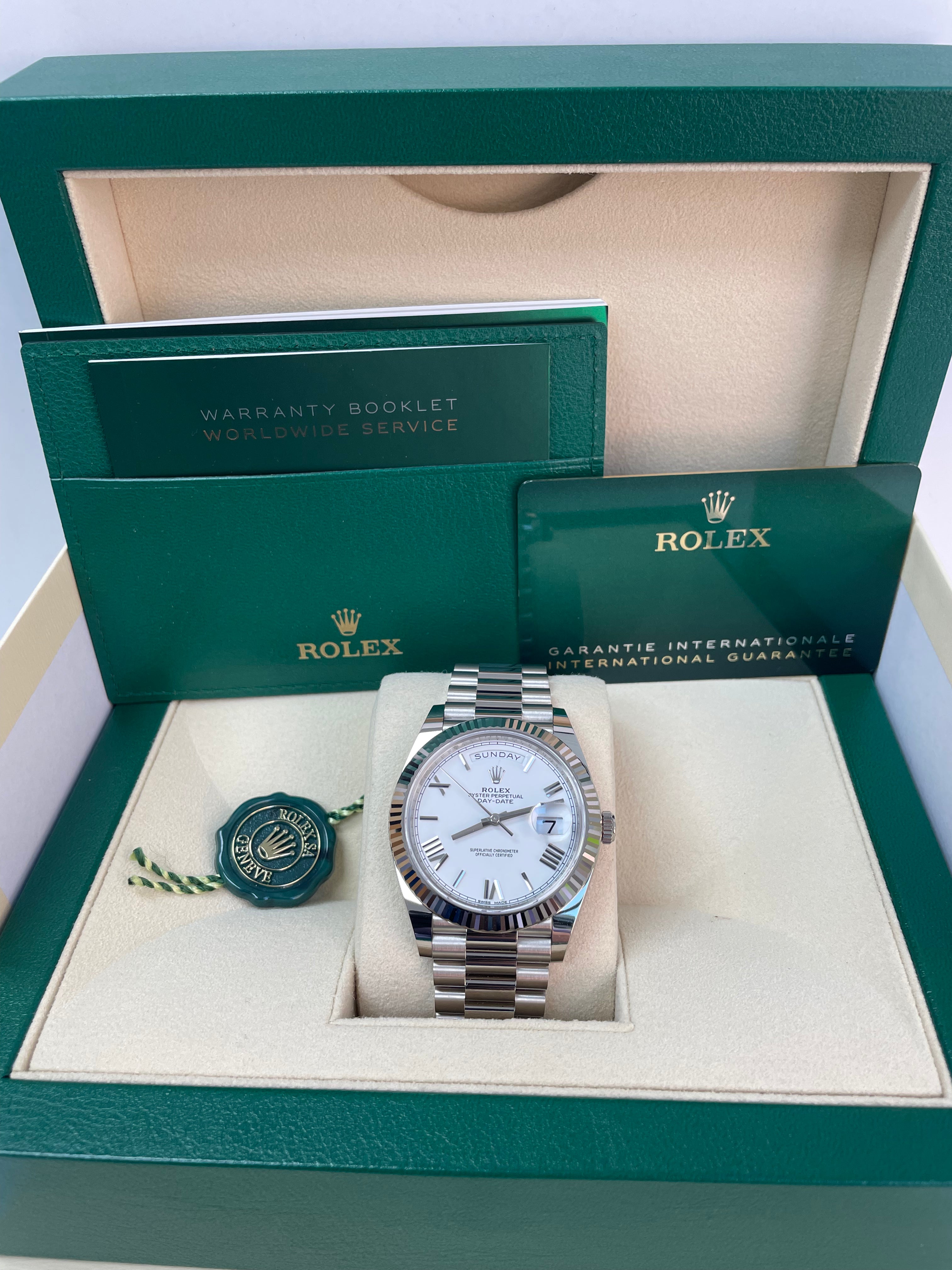 Rolex Day-Date 40mm 18K White Gold Watch with White Roman Dial, Fluted Bezel & President Bracelet (Ref. 228239) - Luxury Dress Watch for Business & Formal Occasions