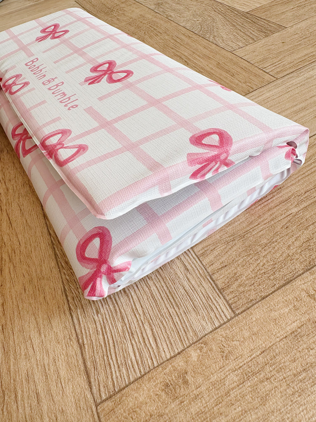 Portable Baby Changing Mat with Pink Bows - Waterproof Foldable Travel Changing Pad for Infants - Perfect for Diaper Changes On-The-Go, Airplane Travel & Outdoor Adventures