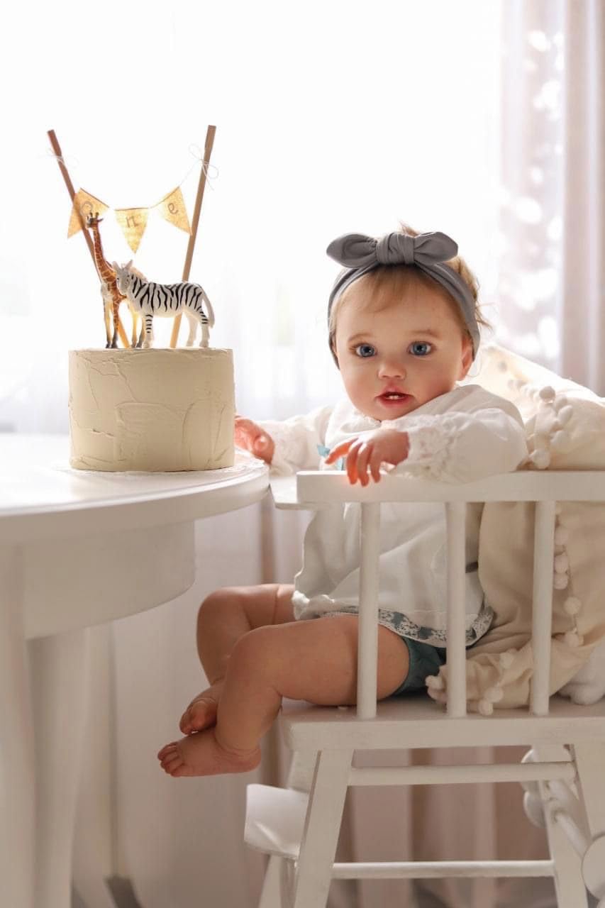 Anano 24 Inch Realistic Reborn Baby Doll - Lifelike Toddler Doll with Soft Body, White Sweater, Headband, Pacifier, Bottle, Diaper & Birth Card | Perfect for Collectors, Gift Giving, Nursery Decor & Playtime
