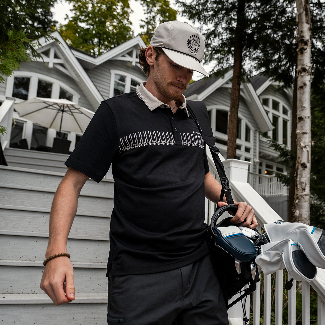 Bauer x TravisMathew Stick Side Polo Shirt for Men - Performance Golf & Casual Wear - Moisture-Wicking & UV Protection