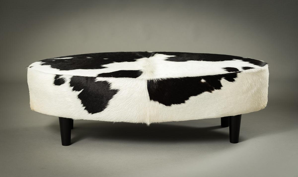 Premium Cowhide Ottoman with Oval Wooden Legs - 47