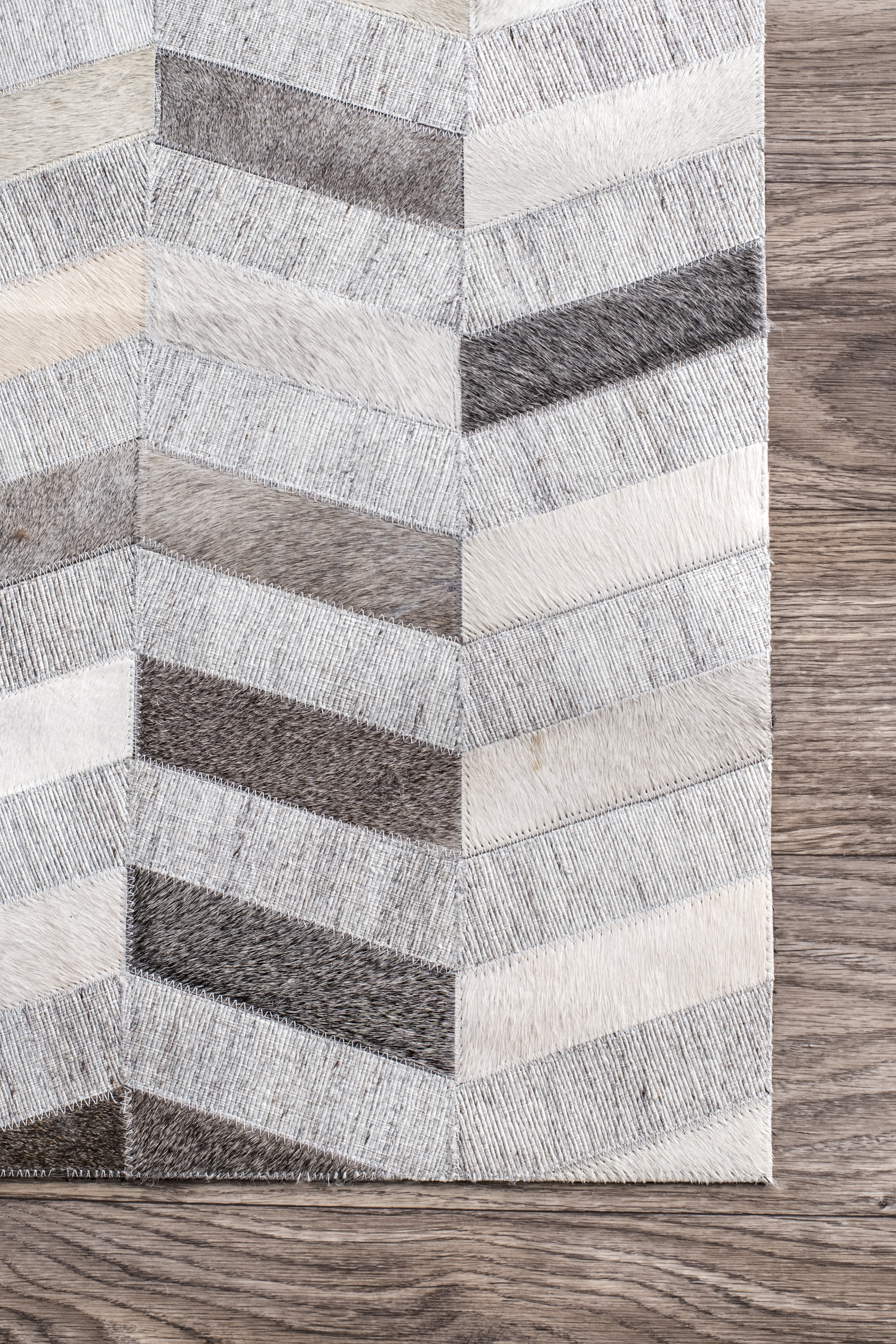 Luxury Cowhide Herringbone Pattern Area Rug in Silver - Perfect for Living Room, Bedroom or Office Decor