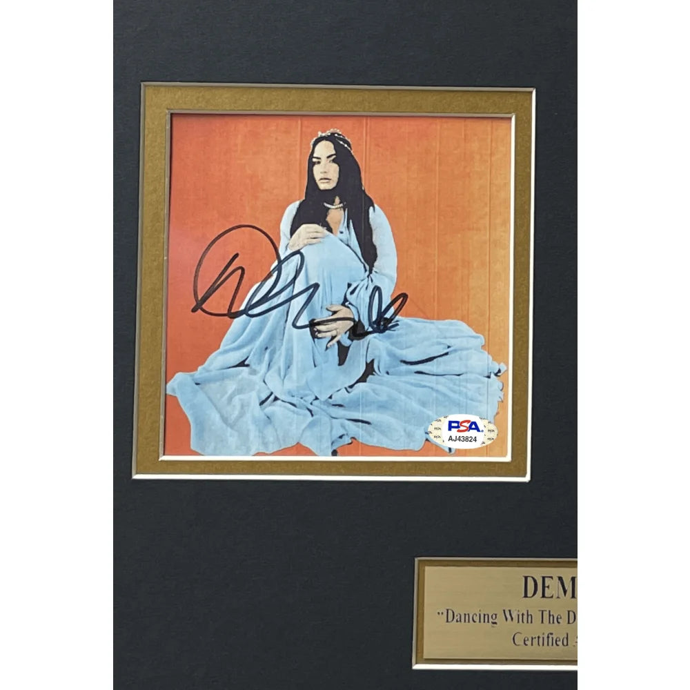 Demi Lovato Autographed Dancing Devil CD Album - PSA/DNA Certified Signed Memorabilia - Framed Collage Display for Music Fans & Collectors - Perfect for Home, Office, or Gift