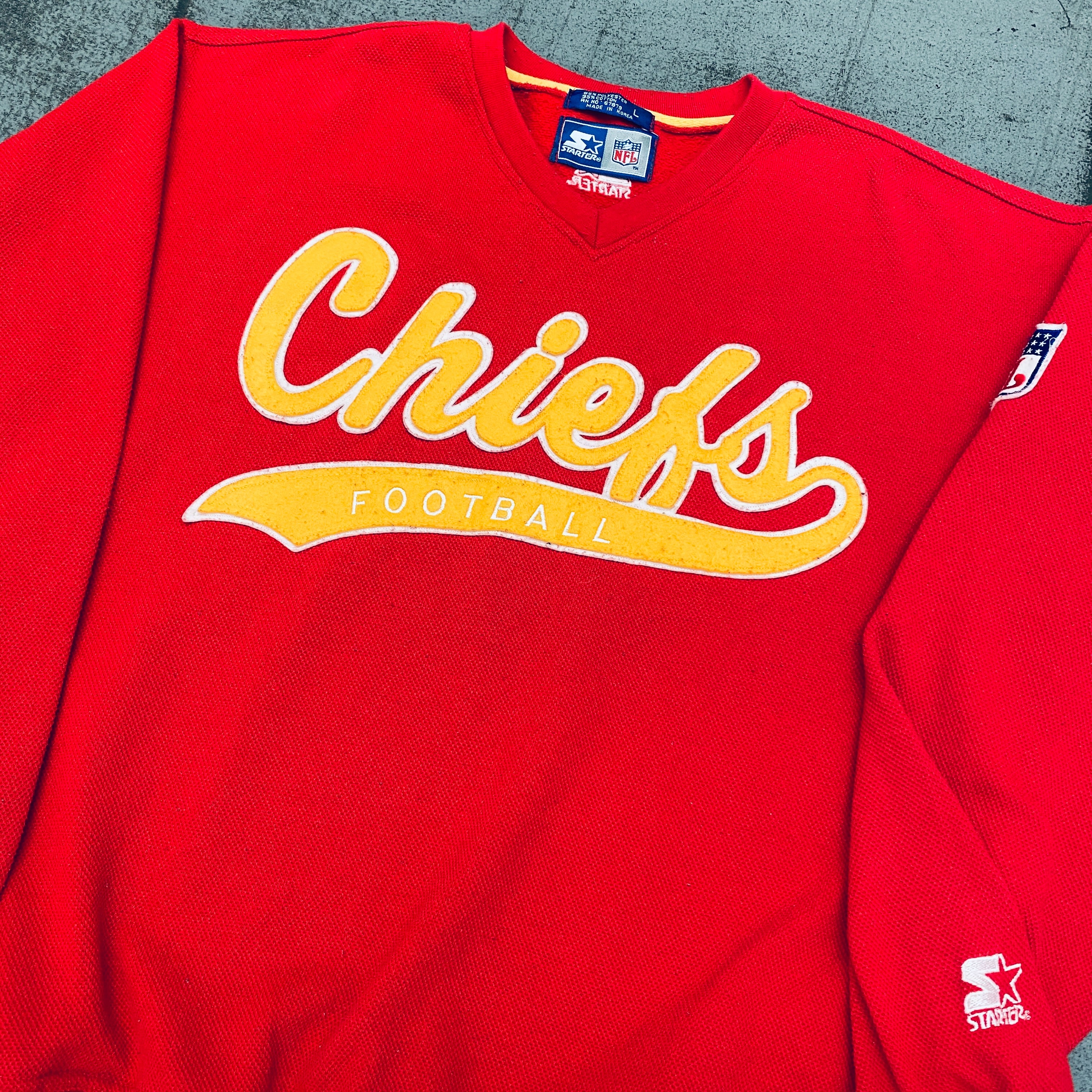 Vintage 1990s Kansas City Chiefs Stitched Script Starter Sweater - Authentic NFL Football Fan Apparel (L/XL) - Perfect for Game Day, Tailgating & Retro Sports Collections