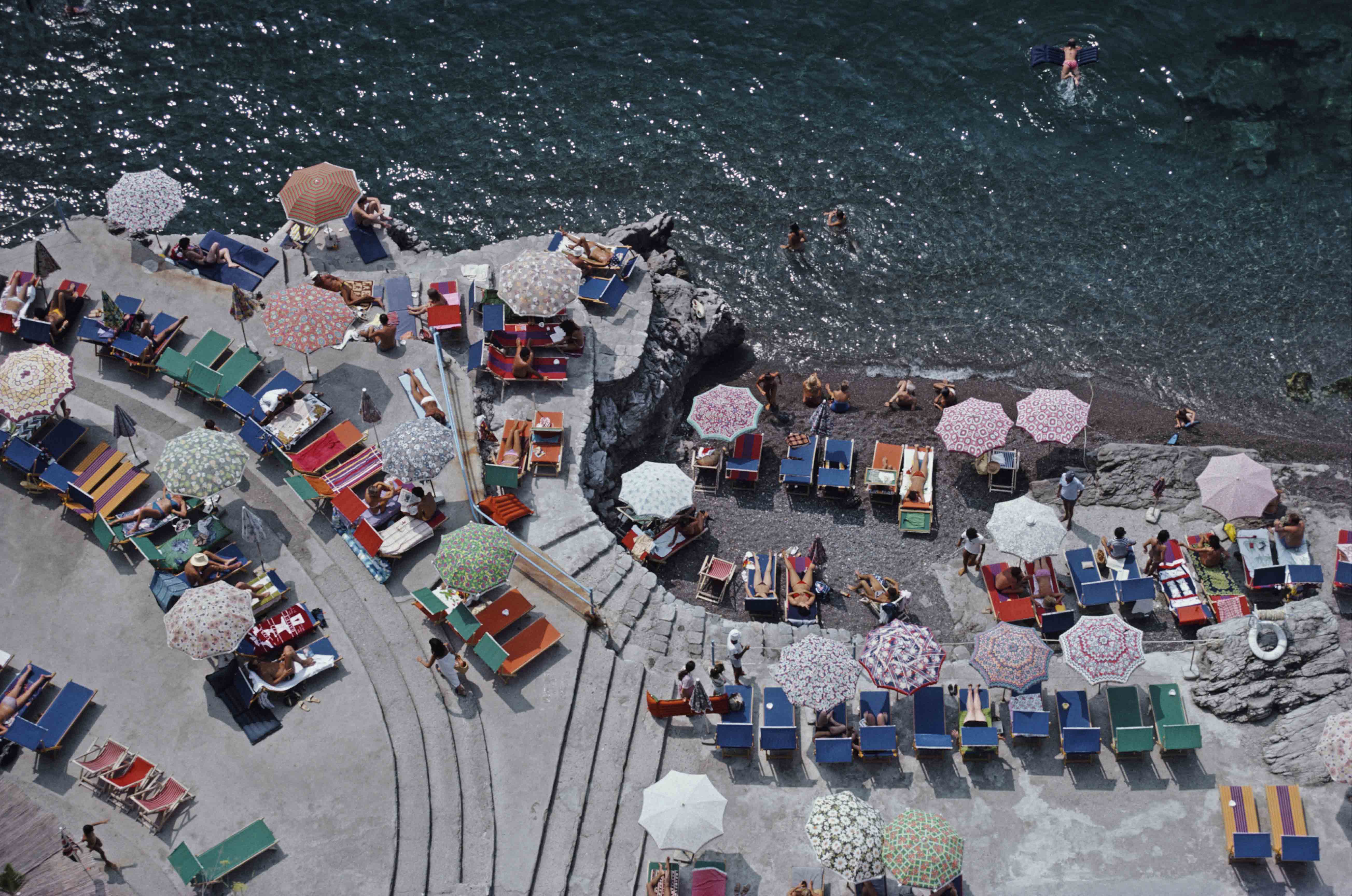Slim Aarons Positano Beach Photograph - Vintage Wall Art for Home & Office Decor - Perfect for Living Rooms, Bedrooms, and Coastal Themed Spaces