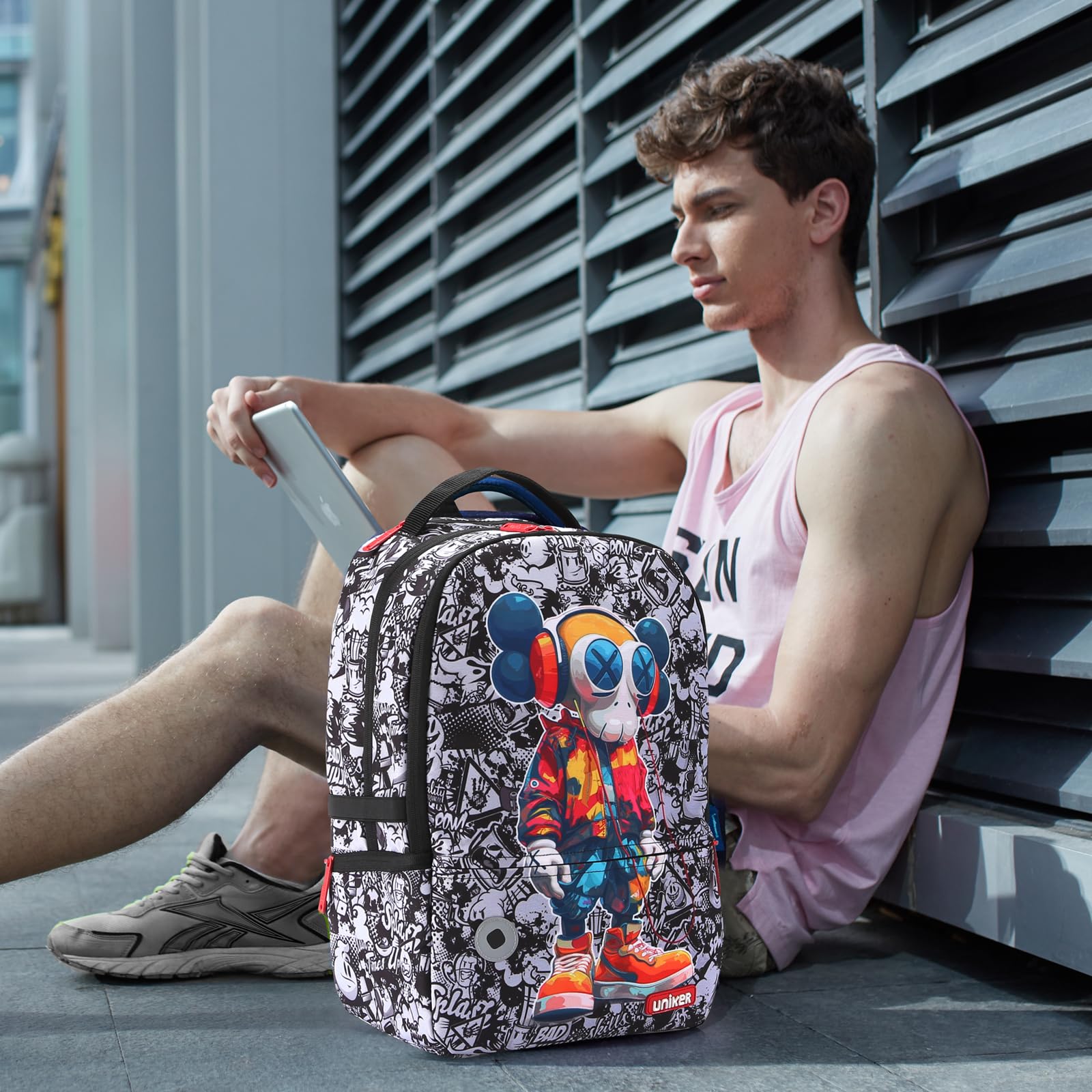 UNIKER Graffiti Backpack for School & Travel - Stylish 15.6 Inch Laptop Backpack for Men & Women - Perfect for College, Work, and Everyday Use