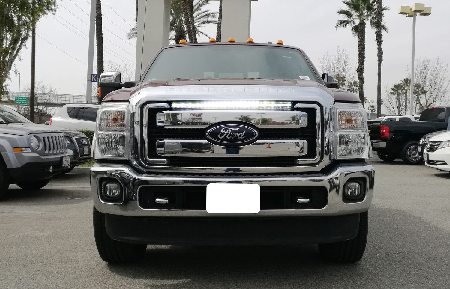 150W 30-Inch LED Light Bar with Behind Grille Mount Bracket & Wiring Kit - Compatible with 2011-2016 Ford F250 F350 Super Duty Trucks - Perfect for Off-Roading, Camping & Night Driving
