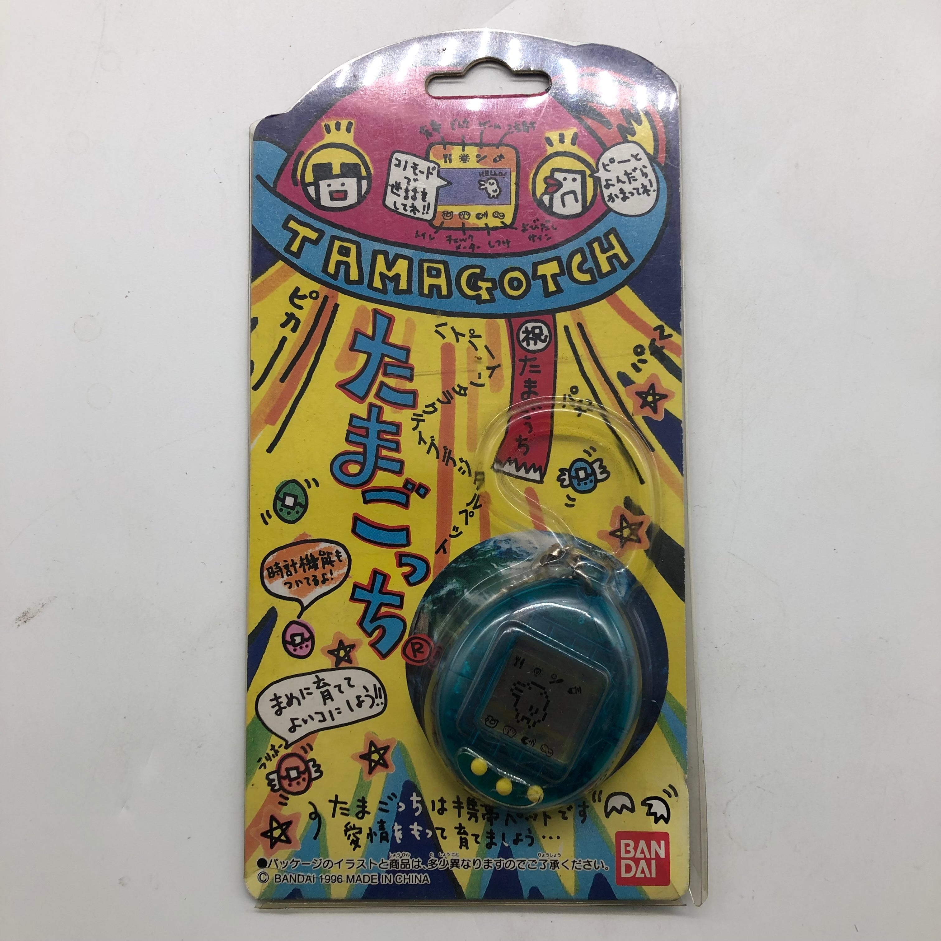Bandai Tamagotchi Digital Virtual Pet - Translucent Blue & Yellow Edition - Fun Interactive Toy for Kids & Adults, Perfect for Stress Relief & Nostalgic Gaming Experience